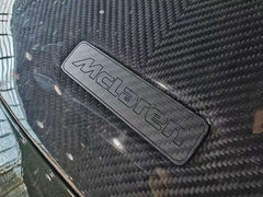 McLaren 570GT 2017 2018 2019 & 540C 570S 2016 2017 2018 2019 2020 & 600LT 2019 2020 & 620R 2021 & 675LT 650S 2015 2016 & 720S 2018 2019 2020 2021 2022 2023 & 750S 2024-ON & 765LT 2021 2022 & Artura 2023-ON & Elva 2021 & GT 2020 2021 2022 2023 & GTS 2025-ON & MP4-12C 2012 2013 2014 & P1 2013 2014 2015 & Senna 2019 2020 with Aftermarket Parts - Emblem Badge Carbon Fiber