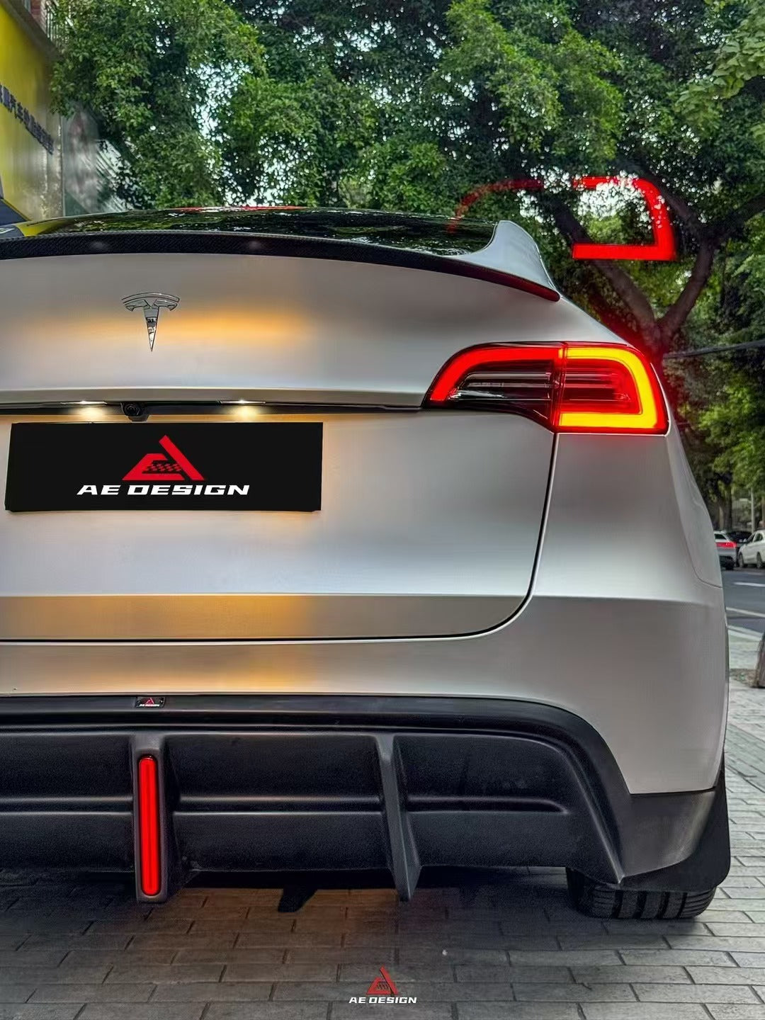 Tesla Model Y 2021 2022 2023 2024 with Aftermarket Parts - Plustic Style?Rear Diffuser ABS from ?ArmorExtend