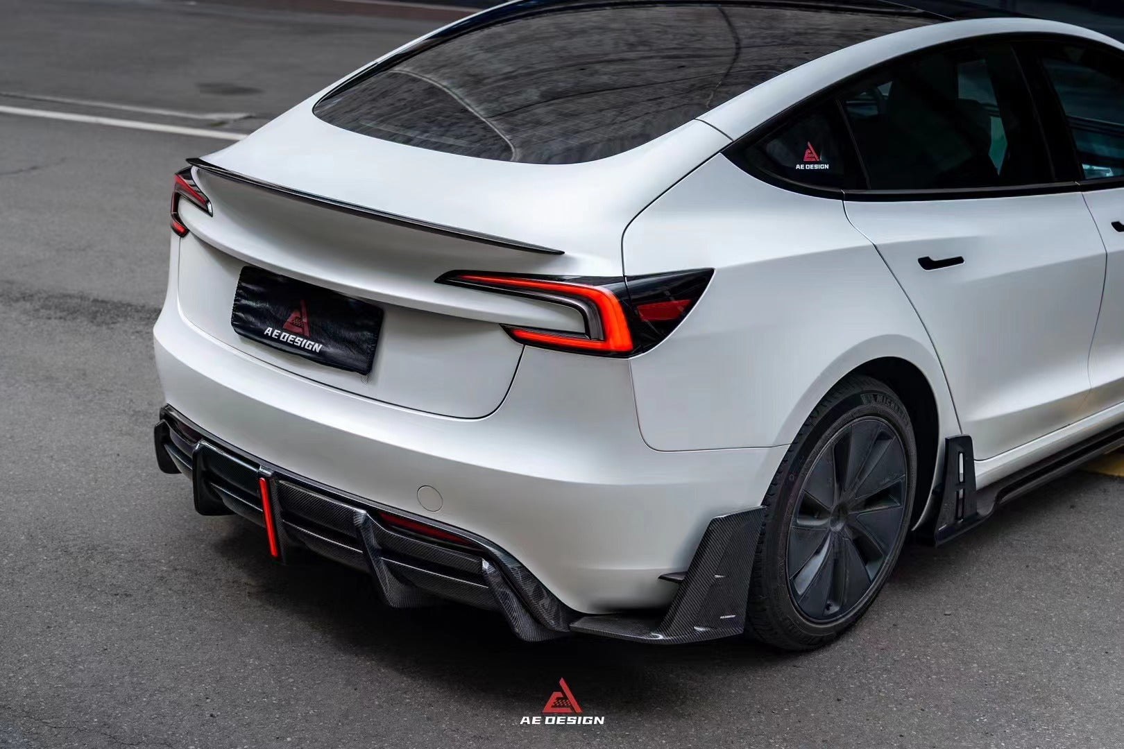 Tesla Model 3 Highland / Performance 2024-ON with Aftermarket Parts - AE Style Rear Diffuser & Canards Carbon Fiber from?ArmorExtend