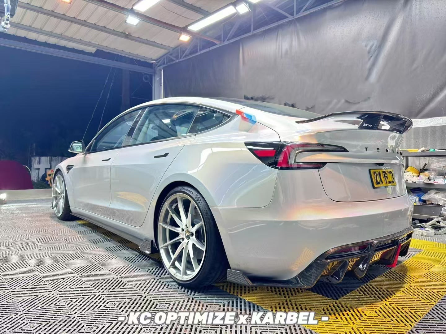 Tesla Model 3 Highland / Performance 2024-ON with Aftermarket Parts - With Light Style Rear Diffuser & Canards Pre-preg Carbon Fiber from Karbel Carbon
