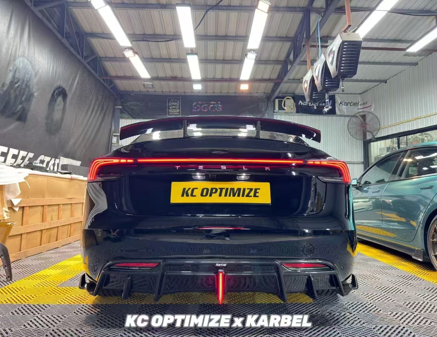 Tesla Model 3 Highland / Performance 2024-ON with Aftermarket Parts - With Light Style Rear Diffuser & Canards Pre-preg Carbon Fiber from Karbel Carbon