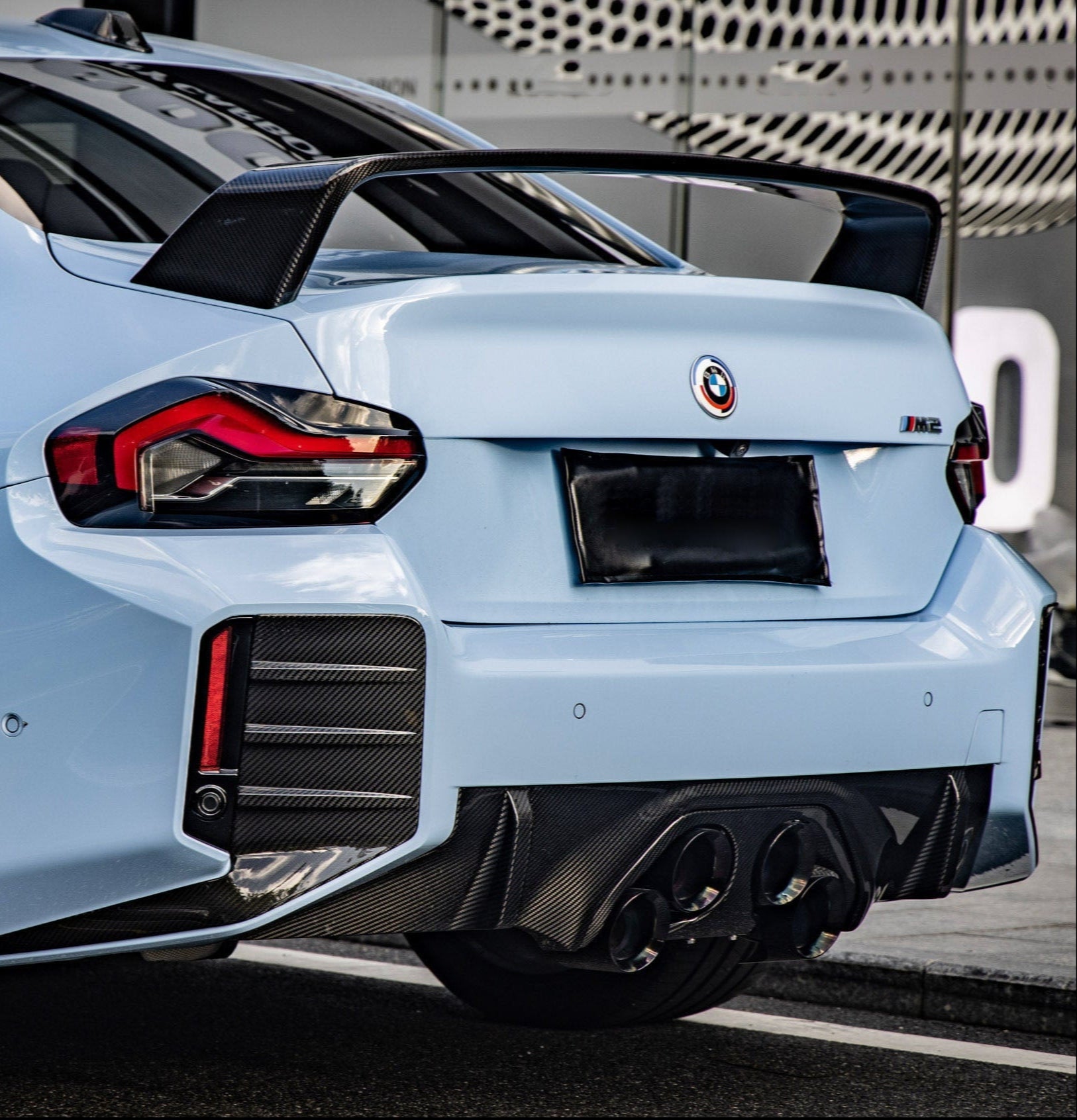 BMW M2 M2C G87 2023 2024 with Aftermarket Parts - MP Style / Center Quad Exit Rear Bumper Center Diffuser Plate Pre-preg Carbon Fiber from Aero Republic