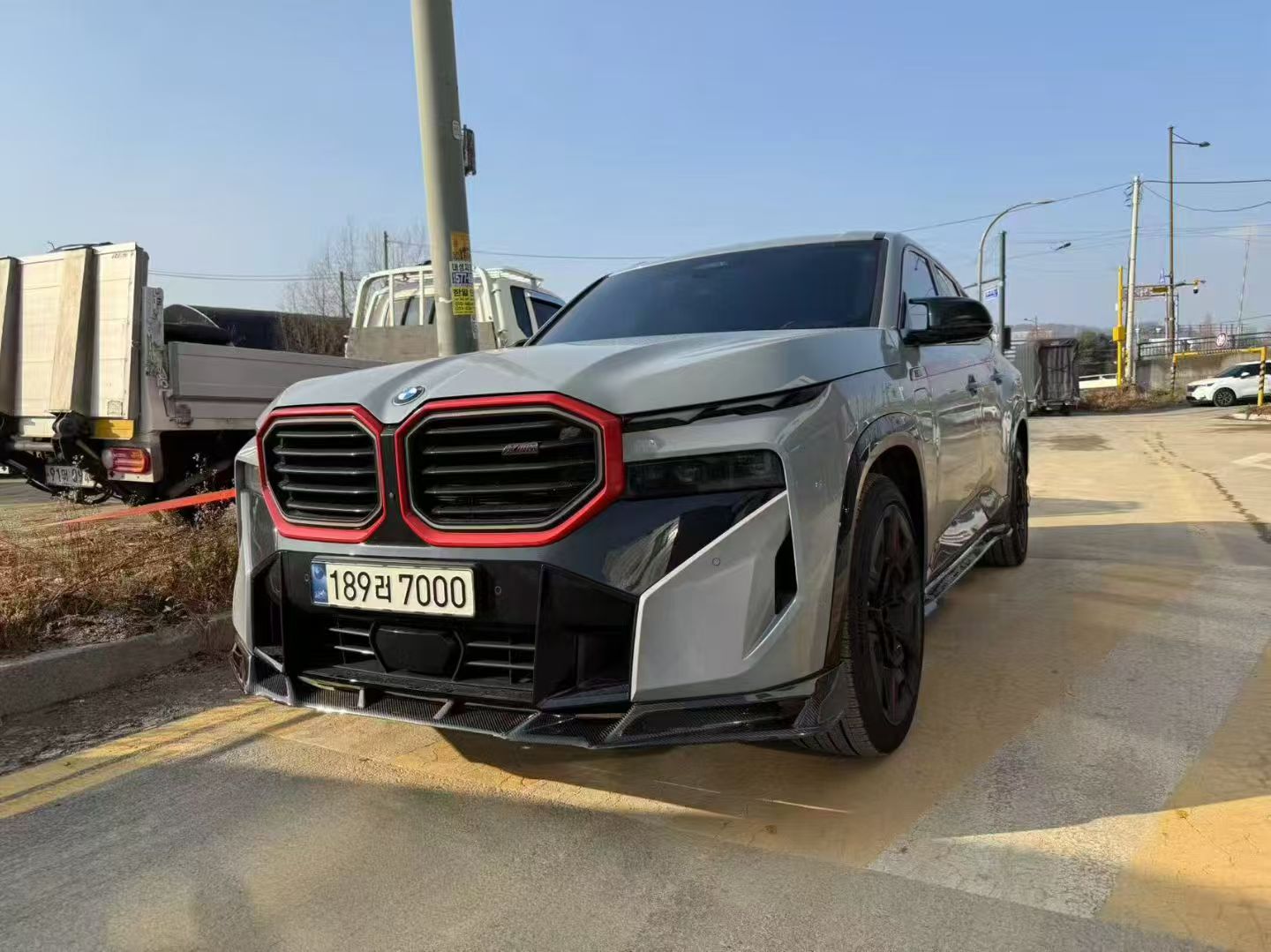 BMW XM / XM Label Red G09 2023-ON with Aftermarket Parts - AE Front Lip Pre-preg Carbon Fiber from ArmorExtend