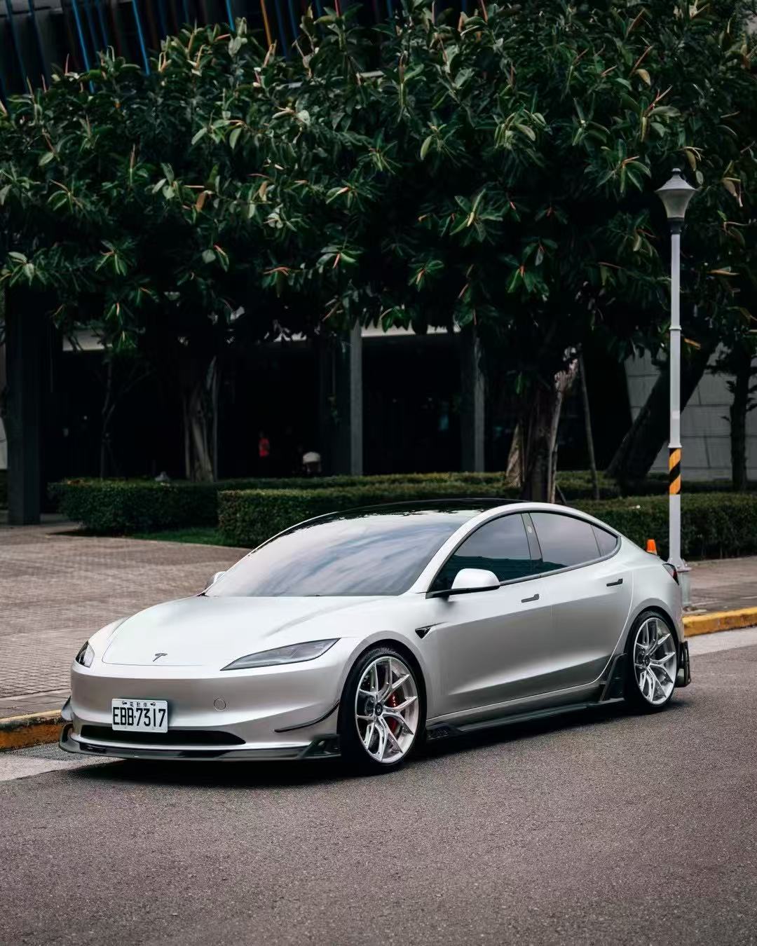 Tesla Model 3 Highland 2024-ON with Aftermarket Parts - AE Style Front Canards Carbon Fiber from?ArmorExtend