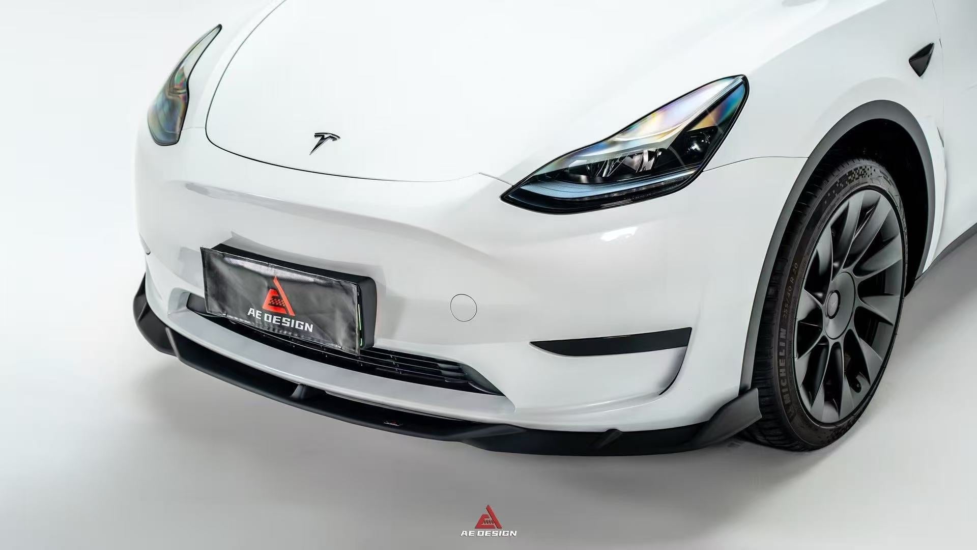 Tesla Model Y 2020 2021 2022 2023 2024 2025 with Aftermarket Parts - Front Lip ABS?from ArmorExtend