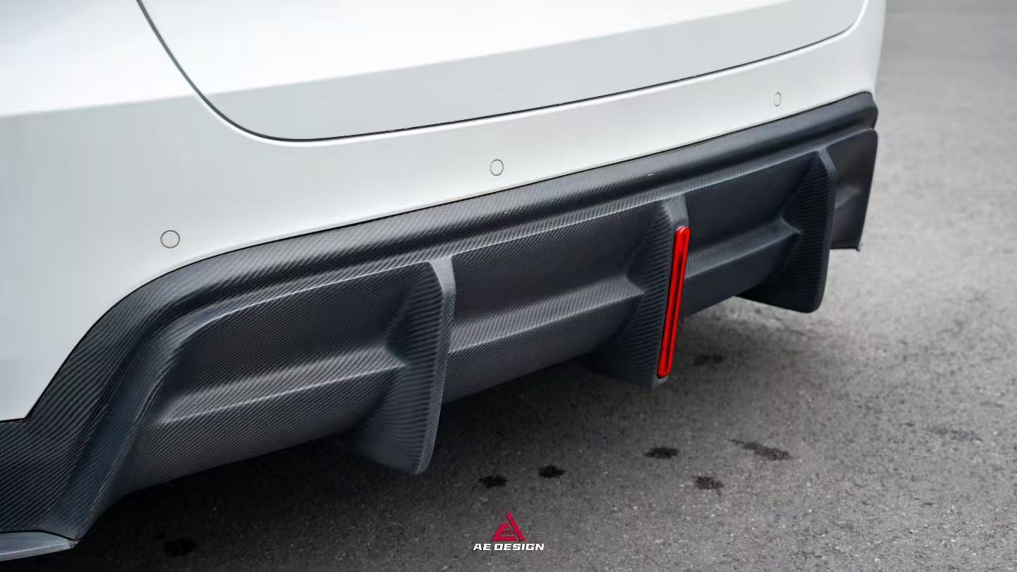 Tesla Model Y 2021 2022 2023 2024 with Aftermarket Parts - Plustic Style Rear Diffuser ABS from  ArmorExtend