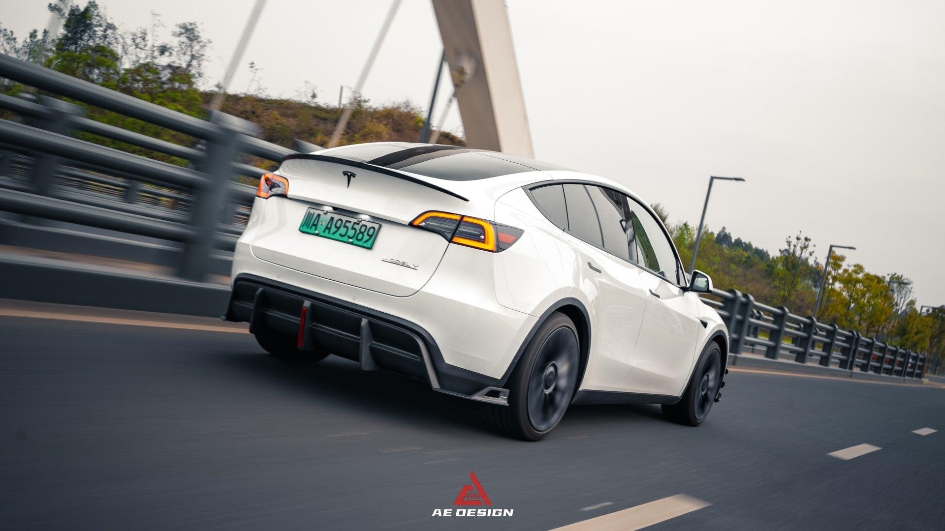 Your Tesla Model Y 2020 2021 2022 2023 2024 with Aftermarket Parts - AE Style Rear Diffuser Carbon Fiber from  ArmorExtend