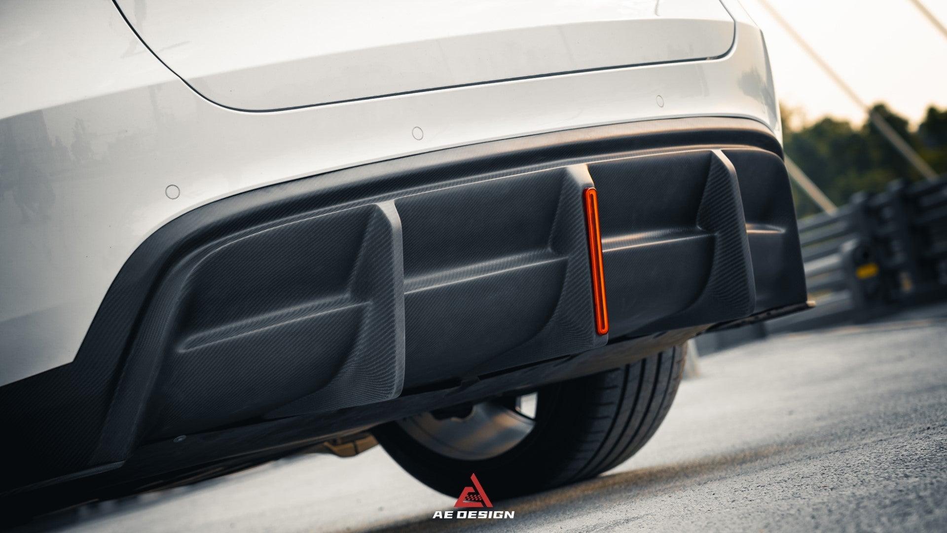 Your Tesla Model Y 2020 2021 2022 2023 2024 with Aftermarket Parts - AE Style Rear Diffuser Carbon Fiber from  ArmorExtend
