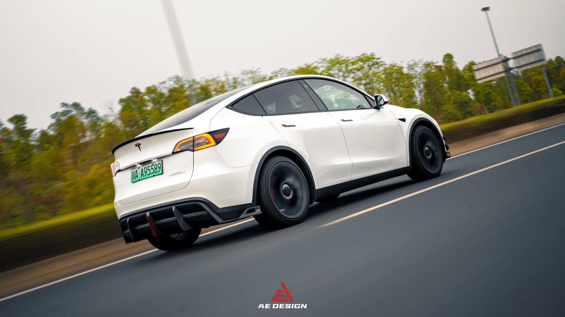 Your Tesla Model Y 2020 2021 2022 2023 2024 with Aftermarket Parts - AE Style Rear Diffuser Carbon Fiber from  ArmorExtend