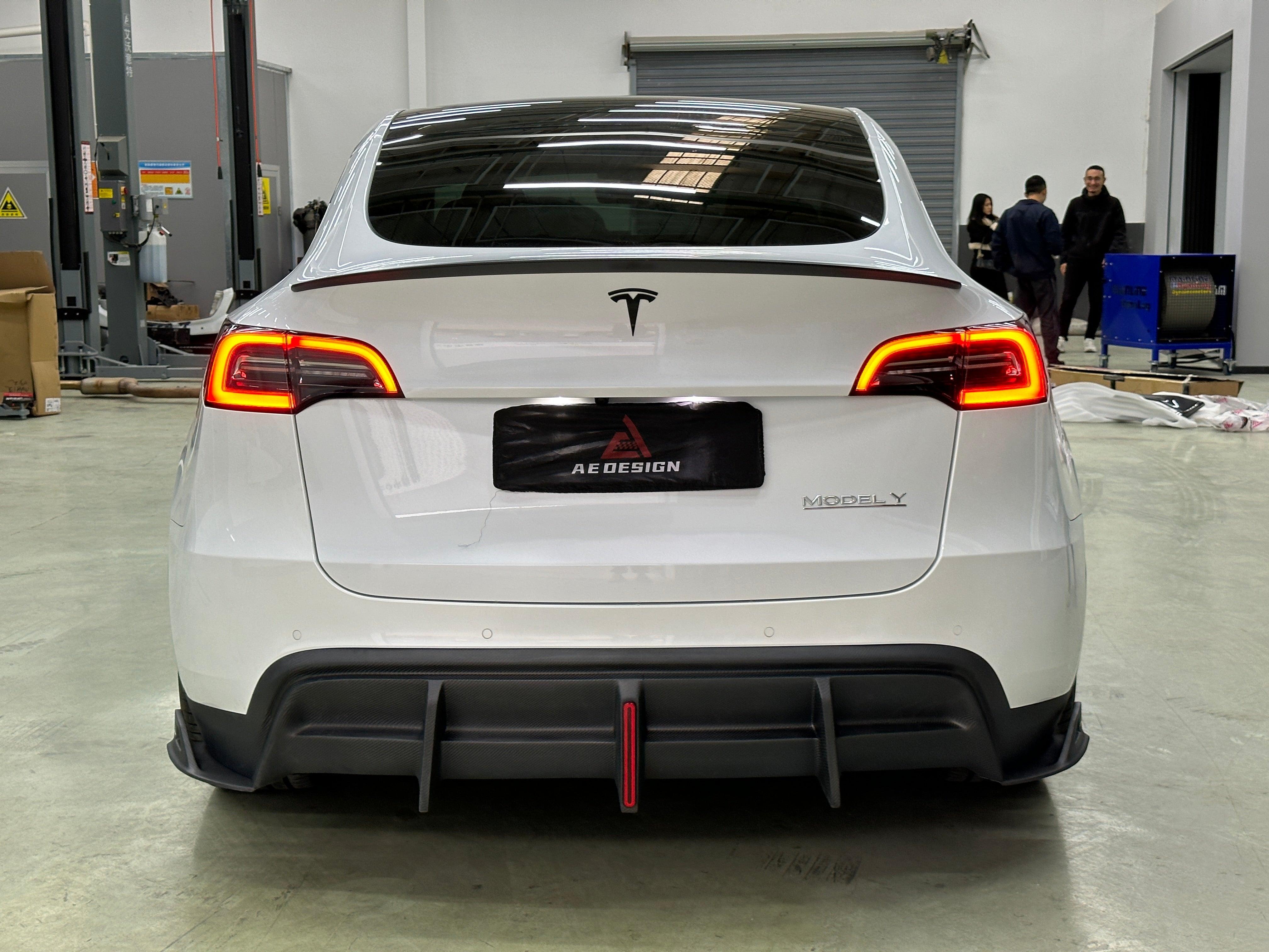 Your Tesla Model Y 2020 2021 2022 2023 2024 with Aftermarket Parts - AE Style Rear Diffuser Carbon Fiber from  ArmorExtend