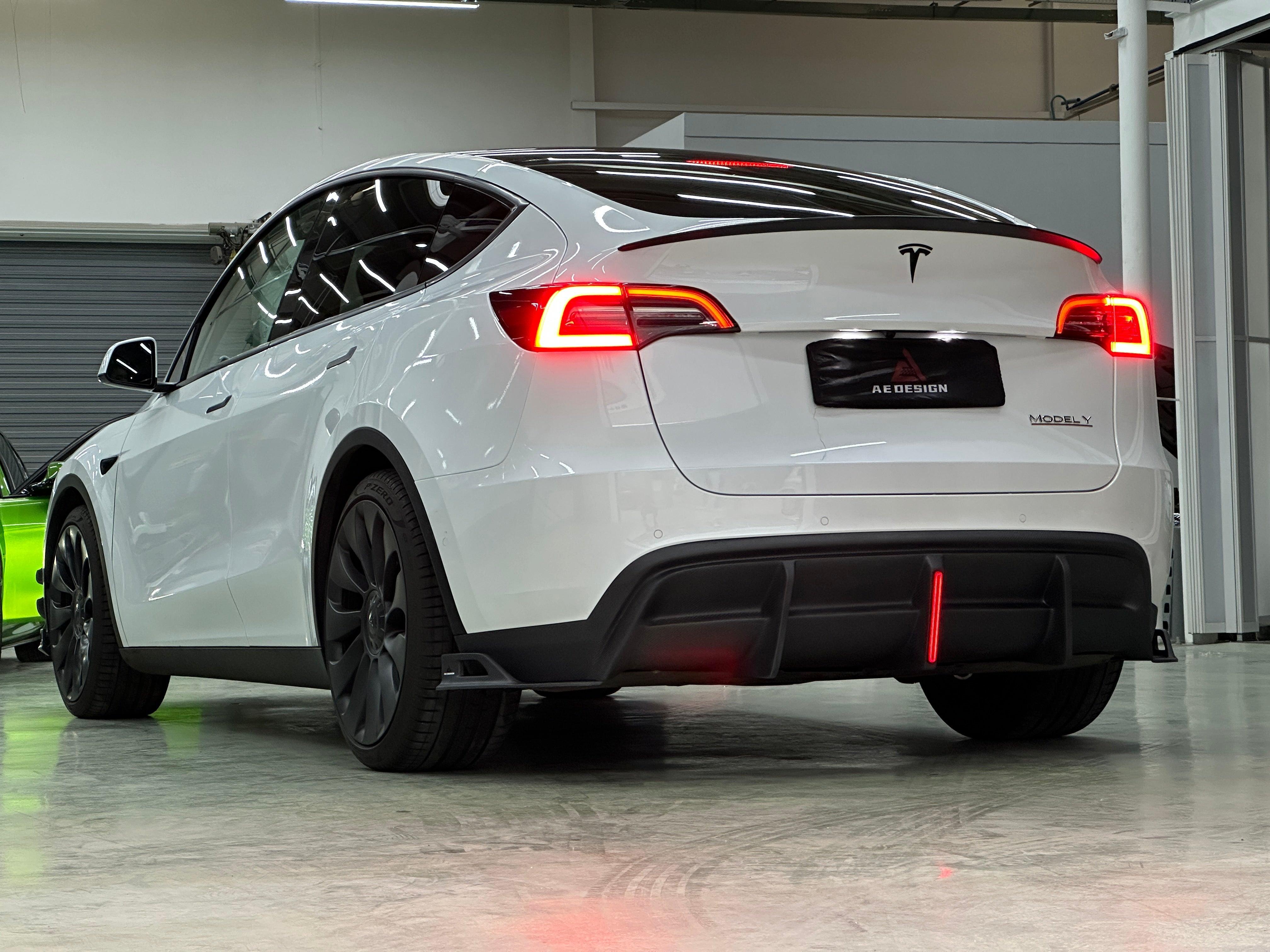 Your Tesla Model Y 2020 2021 2022 2023 2024 with Aftermarket Parts - AE Style Rear Diffuser Carbon Fiber from  ArmorExtend