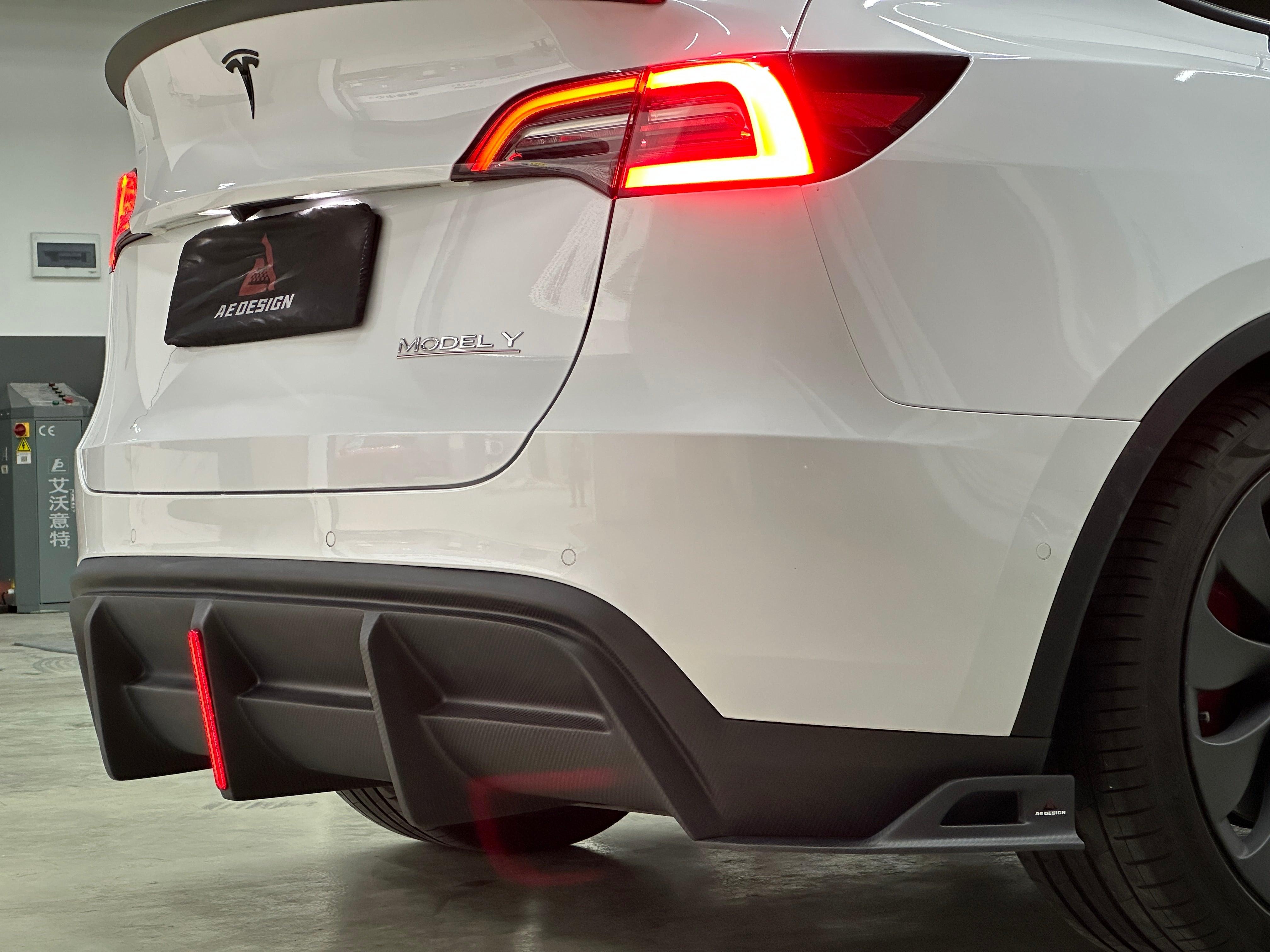 Your Tesla Model Y 2020 2021 2022 2023 2024 with Aftermarket Parts - AE Style Rear Diffuser Carbon Fiber from  ArmorExtend