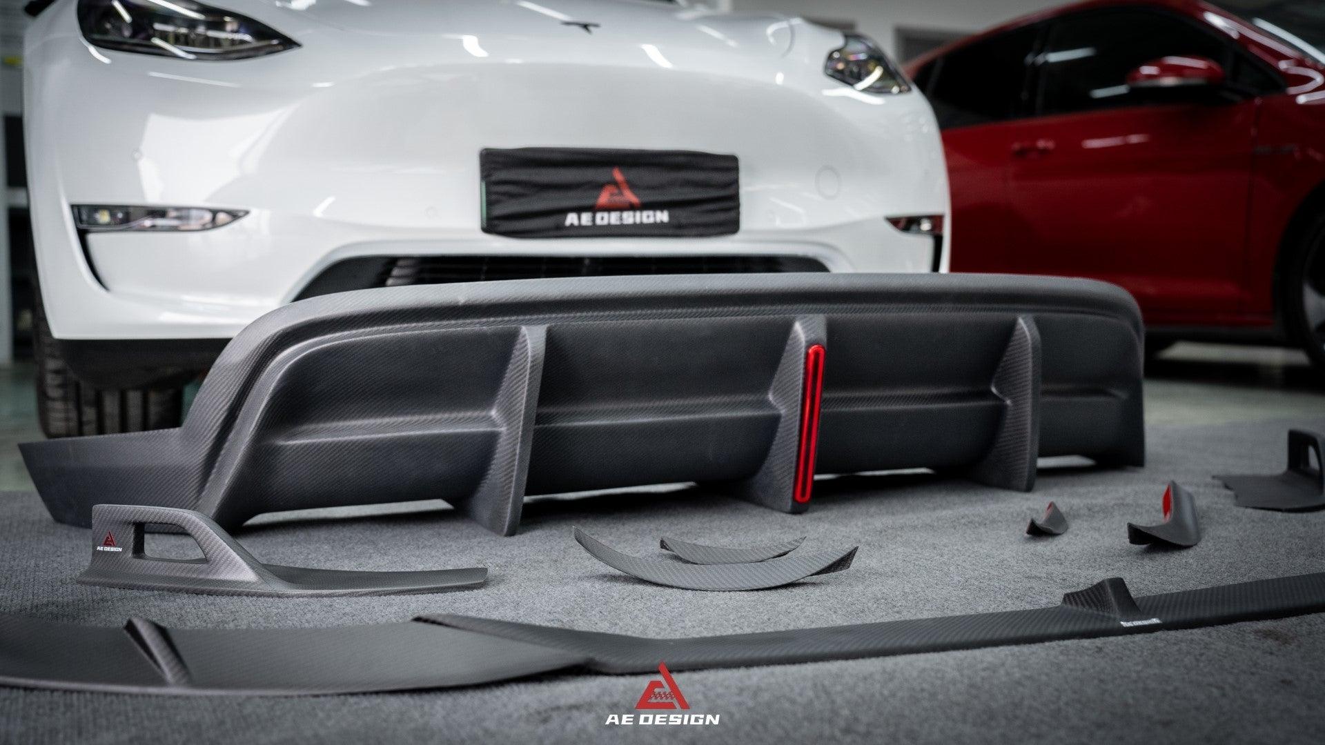 Your Tesla Model Y 2020 2021 2022 2023 2024 with Aftermarket Parts - AE Style Rear Diffuser Carbon Fiber from  ArmorExtend