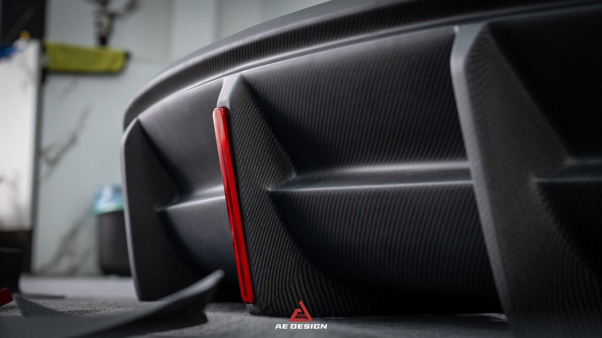 Your Tesla Model Y 2020 2021 2022 2023 2024 with Aftermarket Parts - AE Style Rear Diffuser Carbon Fiber from  ArmorExtend