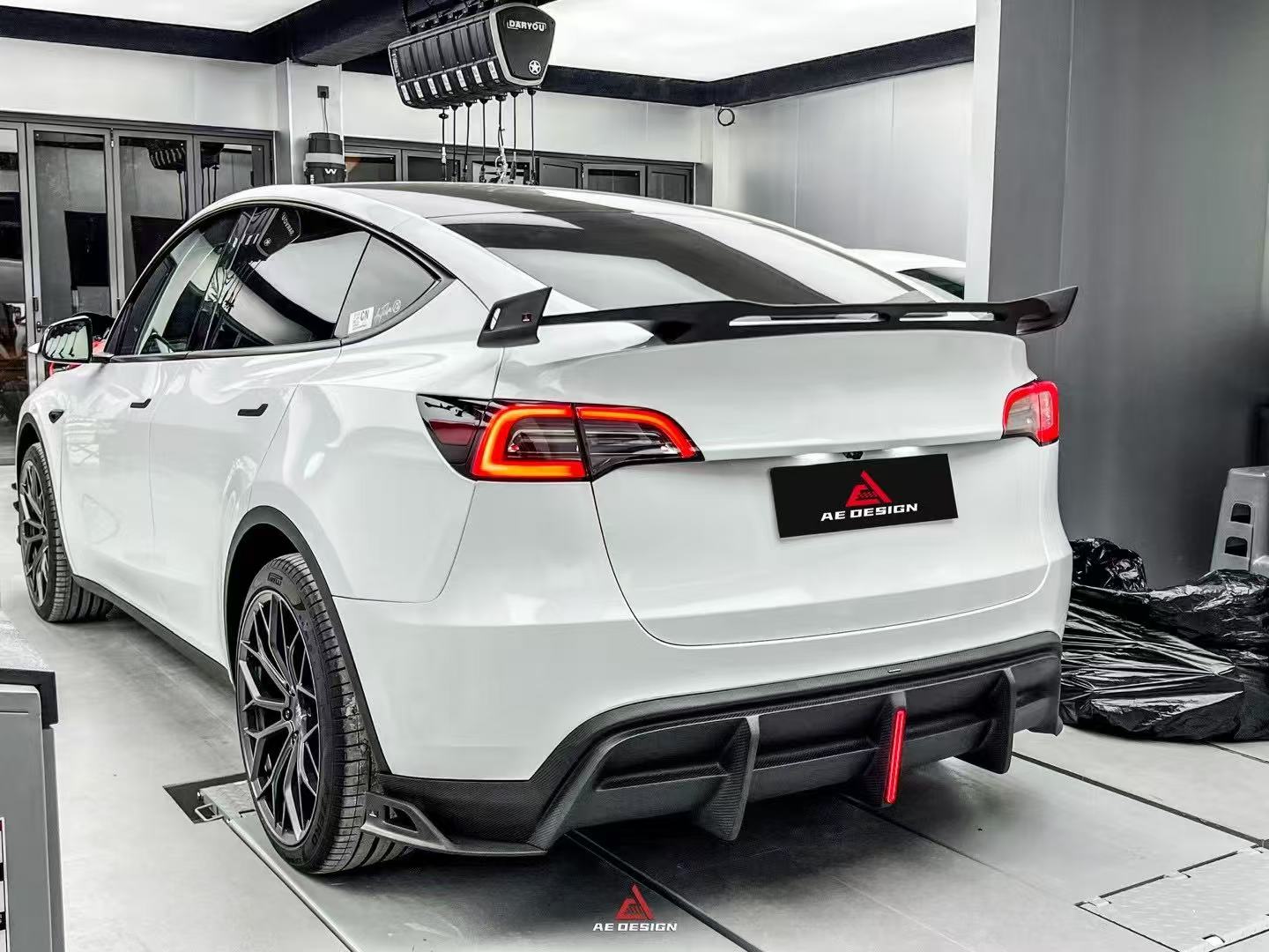 Your Tesla Model Y 2020 2021 2022 2023 2024 with Aftermarket Parts - AE Style Rear Diffuser Carbon Fiber?from??ArmorExtend