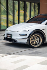 Tesla Model Y Juniper 2026-ON with Aftermarket Parts - Front Lip Dry Pre-preg Carbon Fiber from BCTXE Tuning