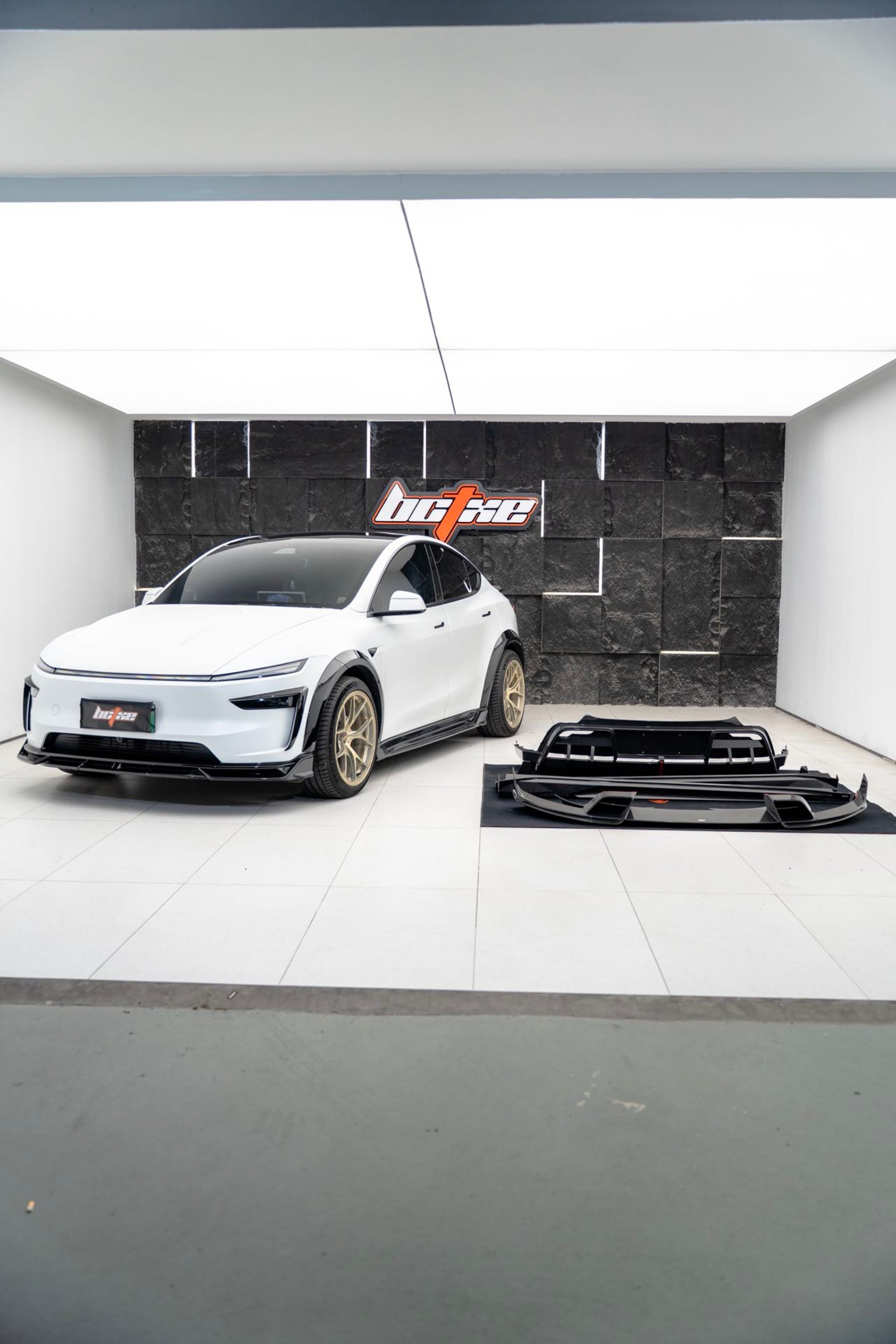 Tesla Model Y Juniper 2026-ON with Aftermarket Parts - Front Lip Dry Pre-preg Carbon Fiber from BCTXE Tuning