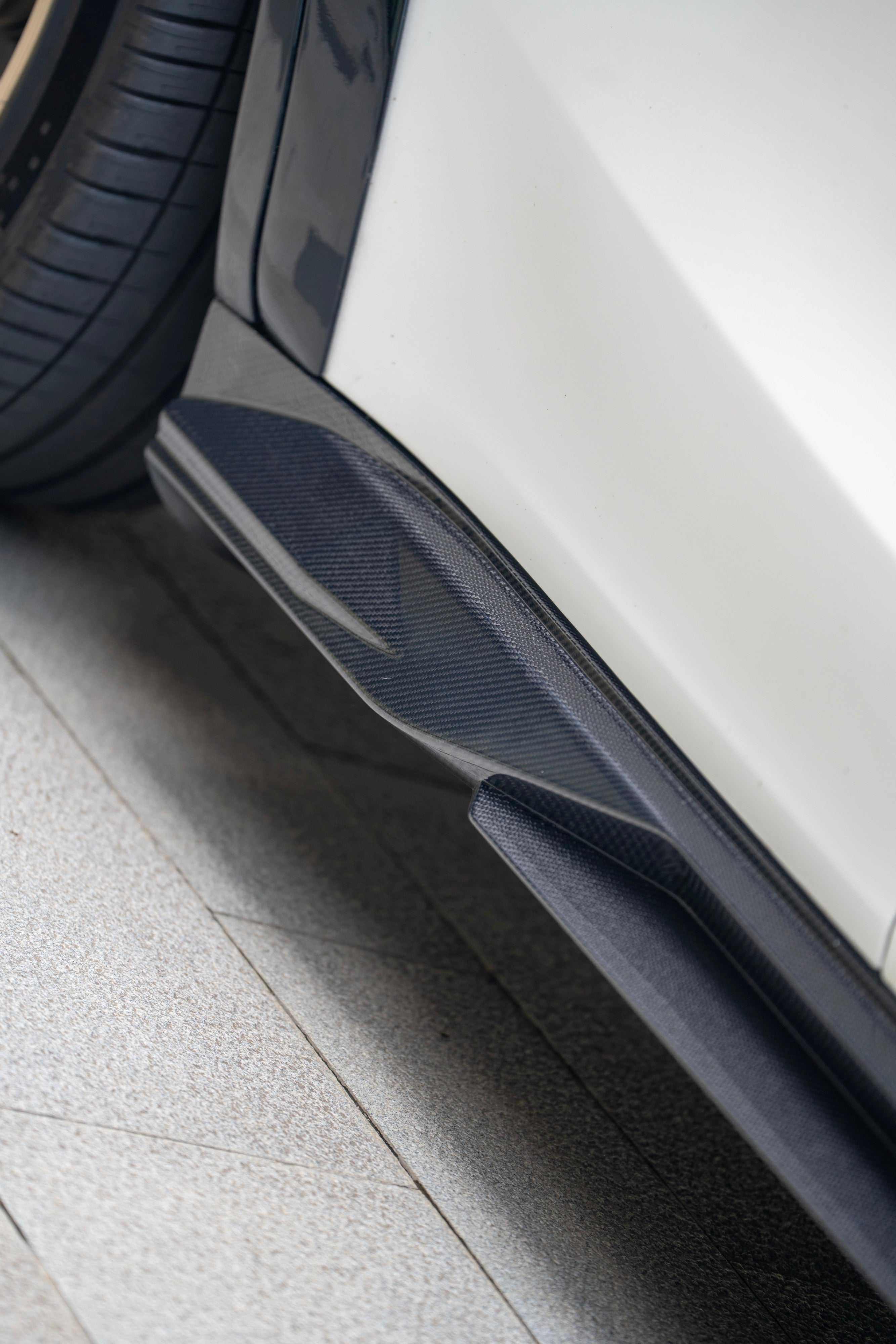 Tesla Model Y Juniper 2026-ON with Aftermarket Parts - Side Skirts Dry Pre-preg Carbon Fiber from BCTXE Tuning