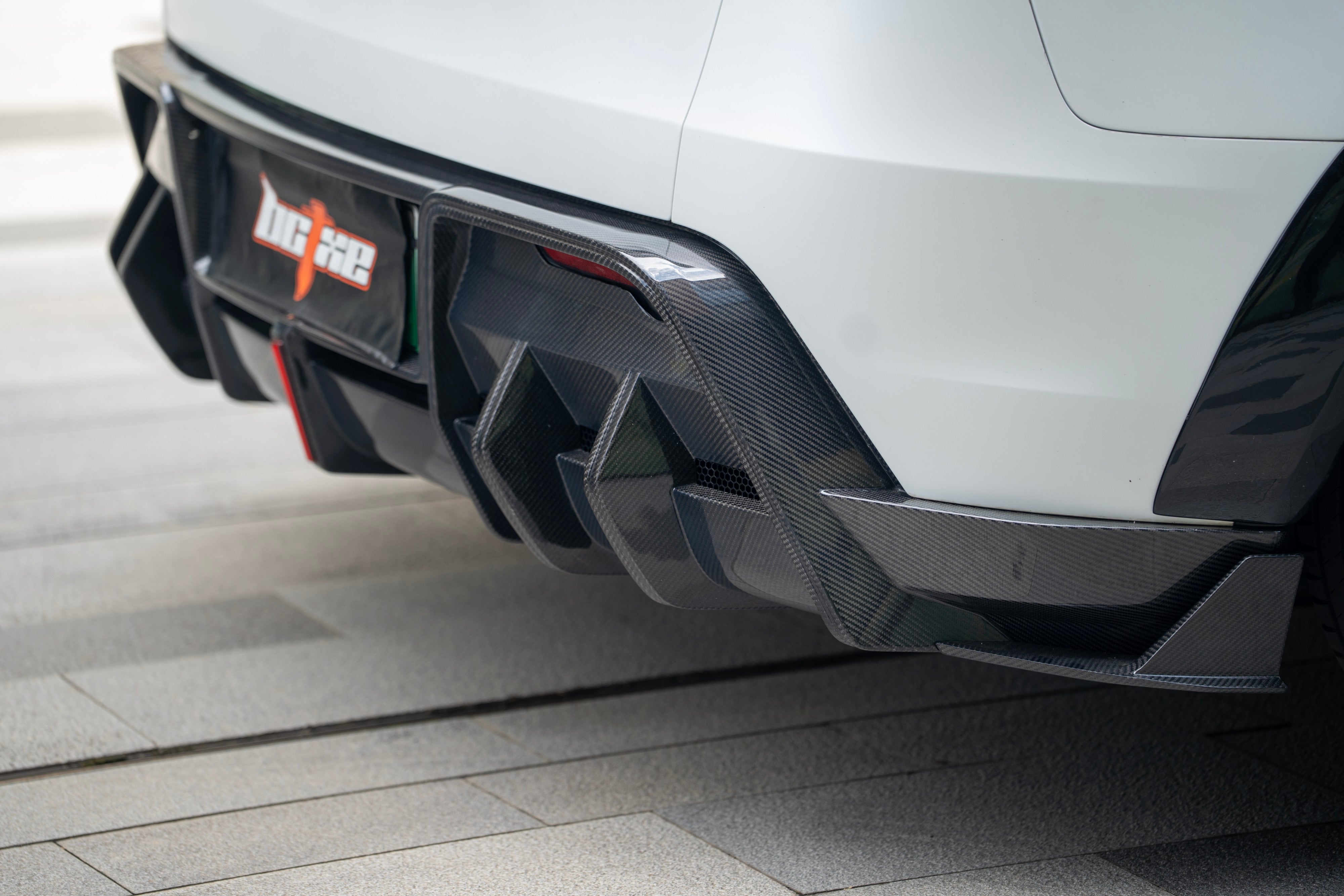 Tesla Model Y Juniper 2026-ON with Aftermarket Parts - Rear Canards Dry Pre-preg Carbon Fiber from BCTXE Tuning