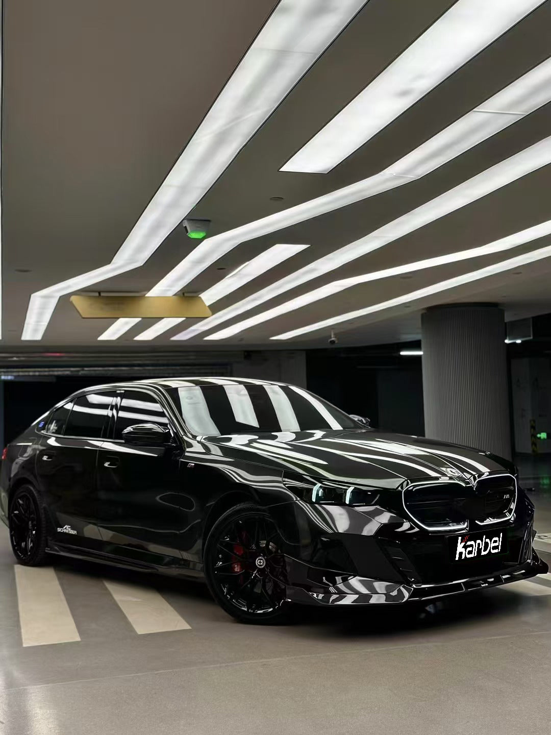 BMW i5 xDrive40 / i5 eDrive40 (with M-package bumper, does not fit base mode) / i5 M60 G60 G61 2024-ON & 5 Series 540i xDrive / 530i xDrive / 530i (with M-package bumper, does not fit base model) / 550e xDrive G60 G61 2024-ON with Aftermarket Parts - Pre-preg Carbon Fiber Front Bumper Lower Center Grill Trim from Karbel Carbon