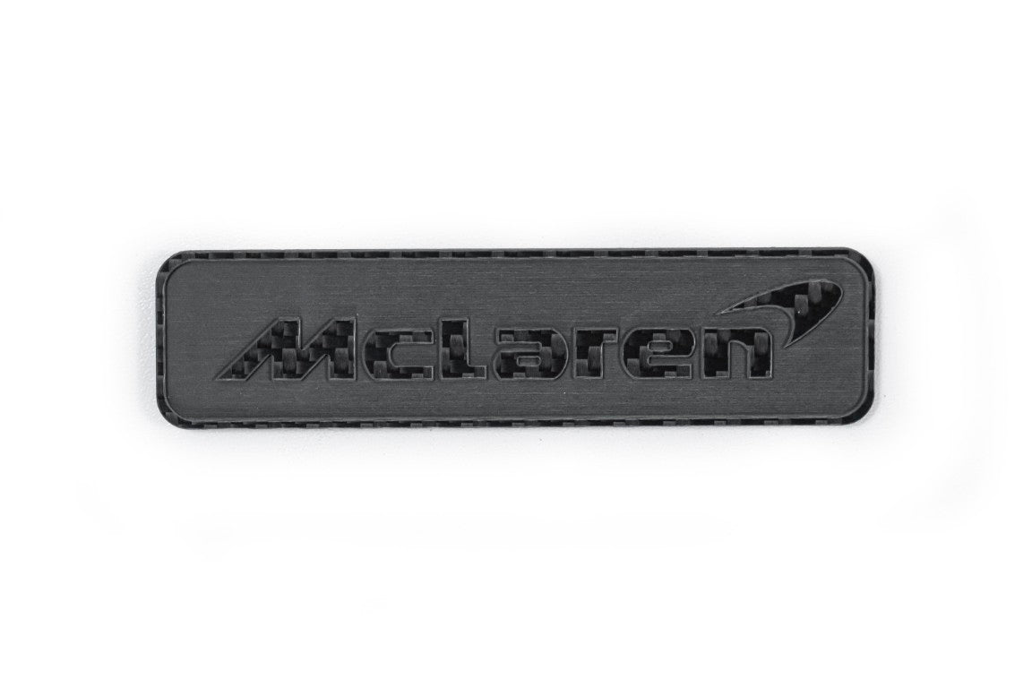 McLaren 570GT 2017 2018 2019 & 540C 570S 2016 2017 2018 2019 2020 & 600LT 2019 2020 & 620R 2021 & 675LT 650S 2015 2016 & 720S 2018 2019 2020 2021 2022 2023 & 750S 2024-ON & 765LT 2021 2022 & Artura 2023-ON & Elva 2021 & GT 2020 2021 2022 2023 & GTS 2025-ON & MP4-12C 2012 2013 2014 & P1 2013 2014 2015 & Senna 2019 2020 with Aftermarket Parts - Emblem Badge Carbon Fiber