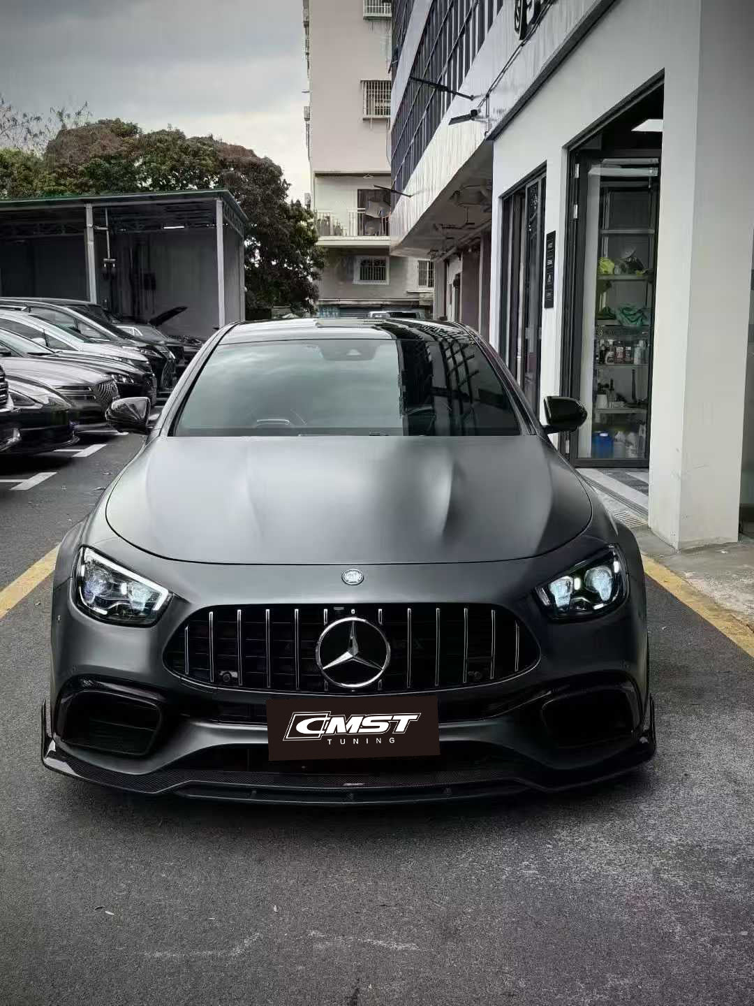 Mercedes Benz E-Class E63S E63 W213 2021-2023 with Aftermarket Parts - Pre-preg Carbon Fiber FRP Front Lip Splitter from CMST Tuning