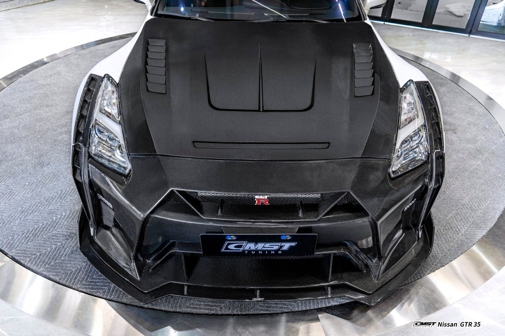 Nissan GTR R35 CBA DBA EBA 2008 2009 2010 2011 2012 2013 2014 2015 2016 2017 2018 2019 2020 2021 2022 2023 2024 (for installation on 2017-2024 vehicles, 2008-2016 hood is recommended) with Aftermarket Parts - HORIZON Front Bumper & Undertray Carbon Fiber / FRP from CMST Tuning