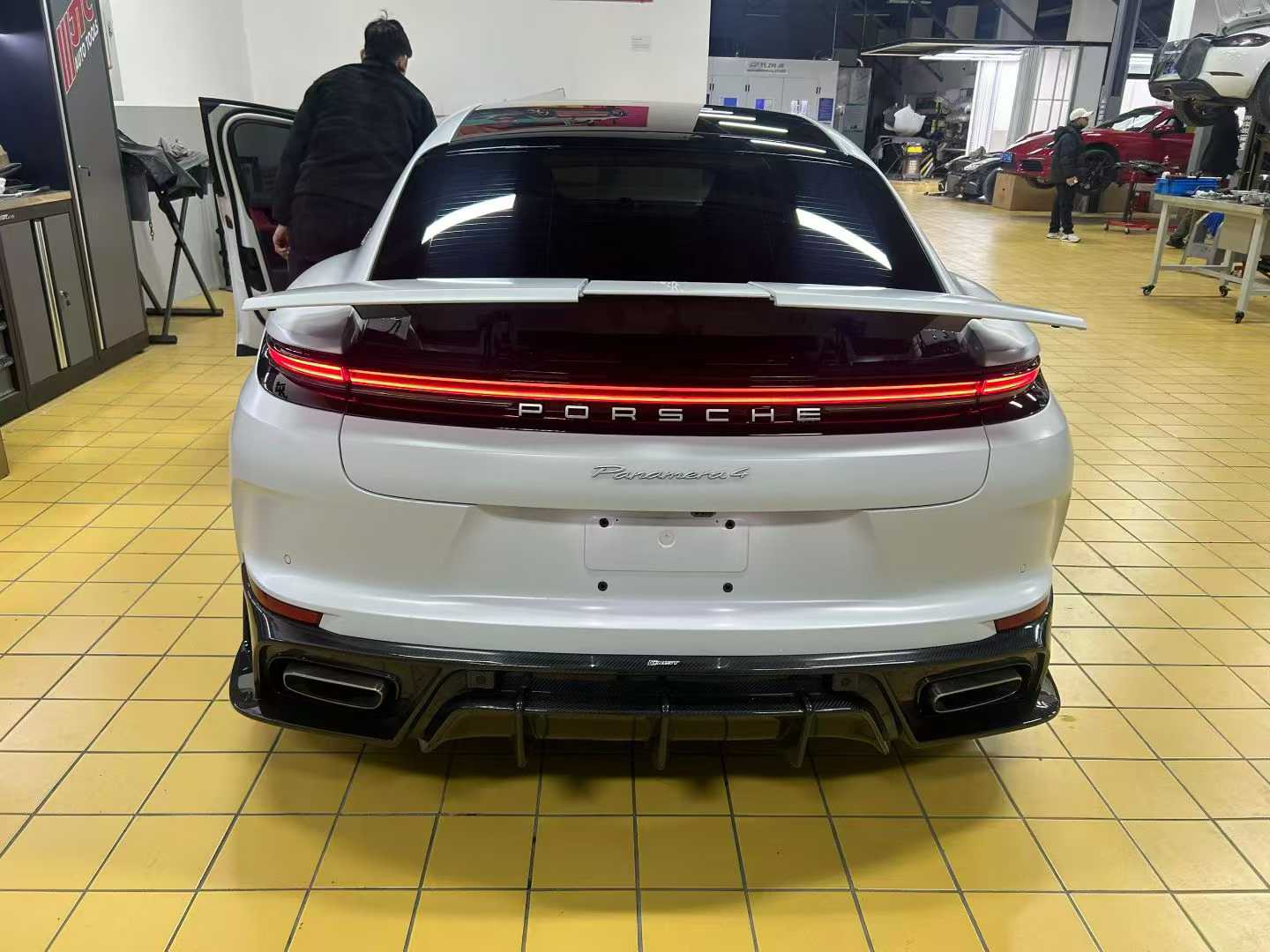 Porsche Panamera 976 Base 4 4S E-Hybird GTS Turbo 2024 with Aftermarket Parts - Rear Diffuser & Canards Pre-preg Carbon Fiber / FRP from CMST Tuning