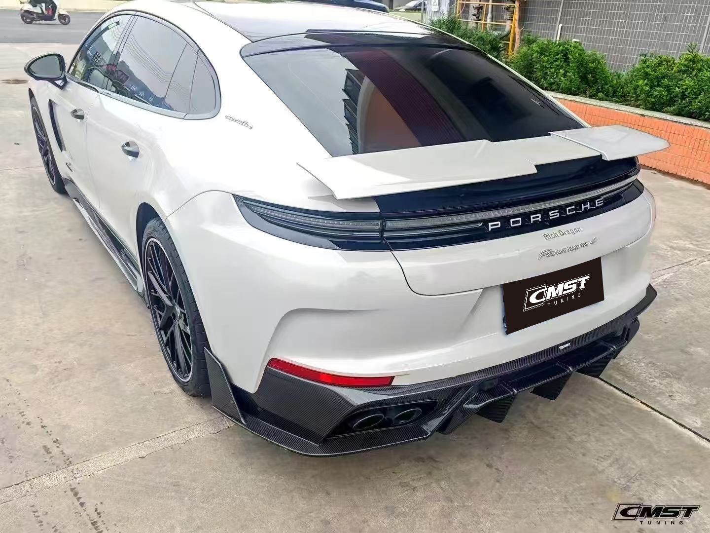 Porsche Panamera 976 Base 4 4S E-Hybird GTS Turbo 2024 with Aftermarket Parts - Rear Diffuser & Canards Pre-preg Carbon Fiber / FRP from CMST Tuning