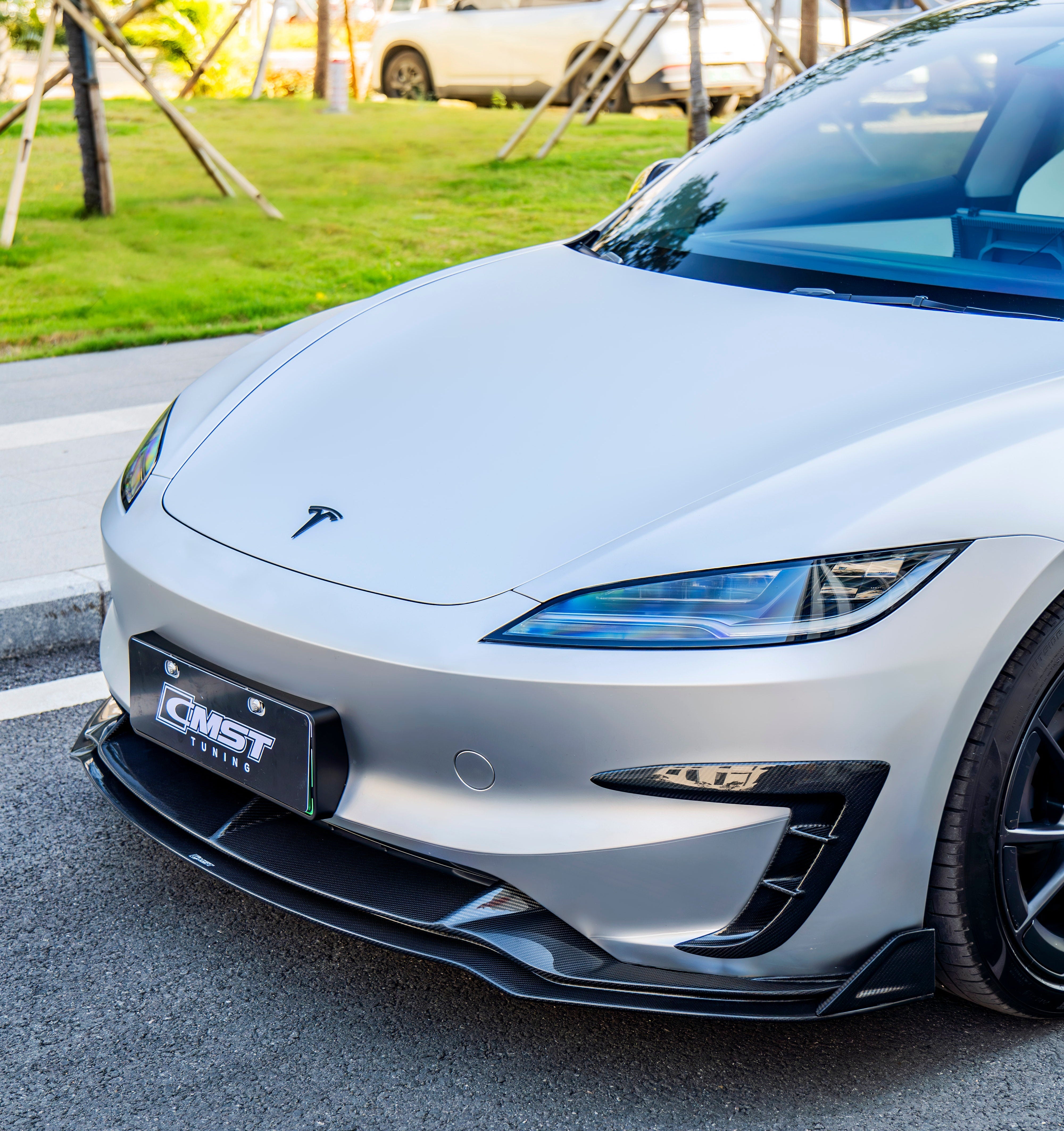 Tesla Model 3 Performance 2024-ON with Aftermarket Parts - V2 Front Lip Carbon Fiber / FRP from CMST Tuning