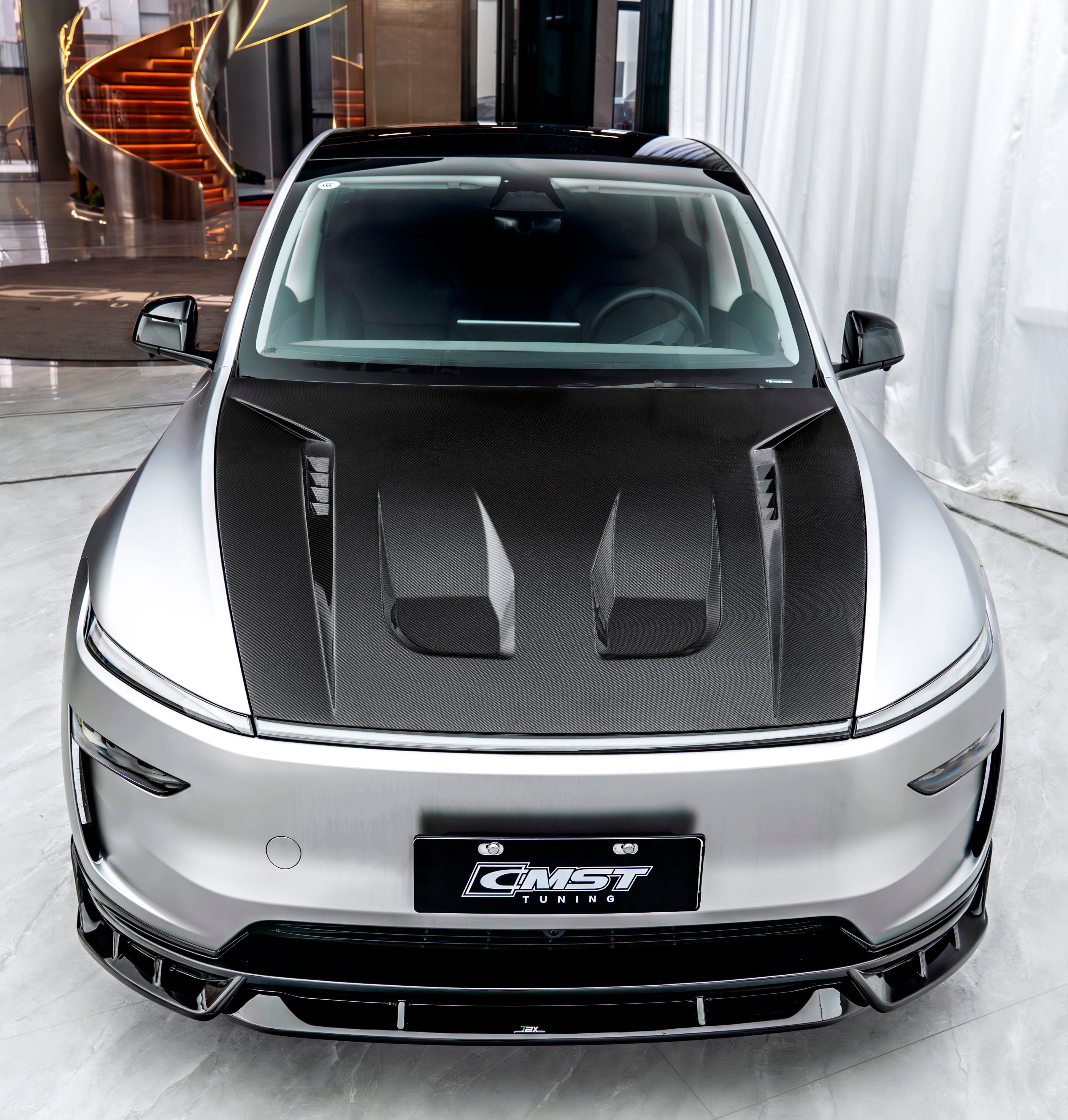 Tesla Model Y Juniper 2026-ON with Aftermarket Parts - V1 Hood Carbon Fiber / FRP from CMST Tuning