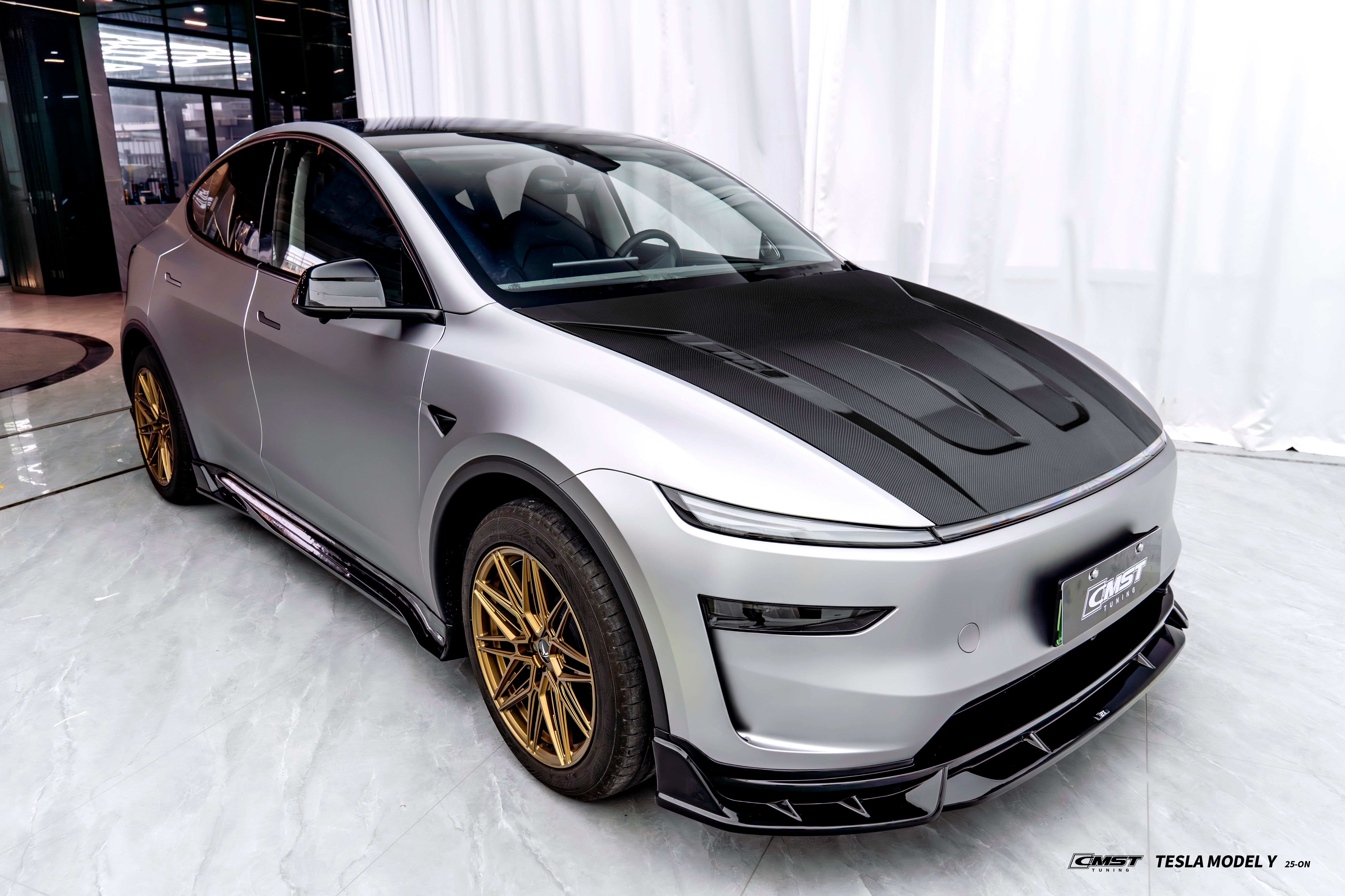 Tesla Model Y Juniper 2026-ON with Aftermarket Parts - V1 Hood Carbon Fiber / FRP from CMST Tuning