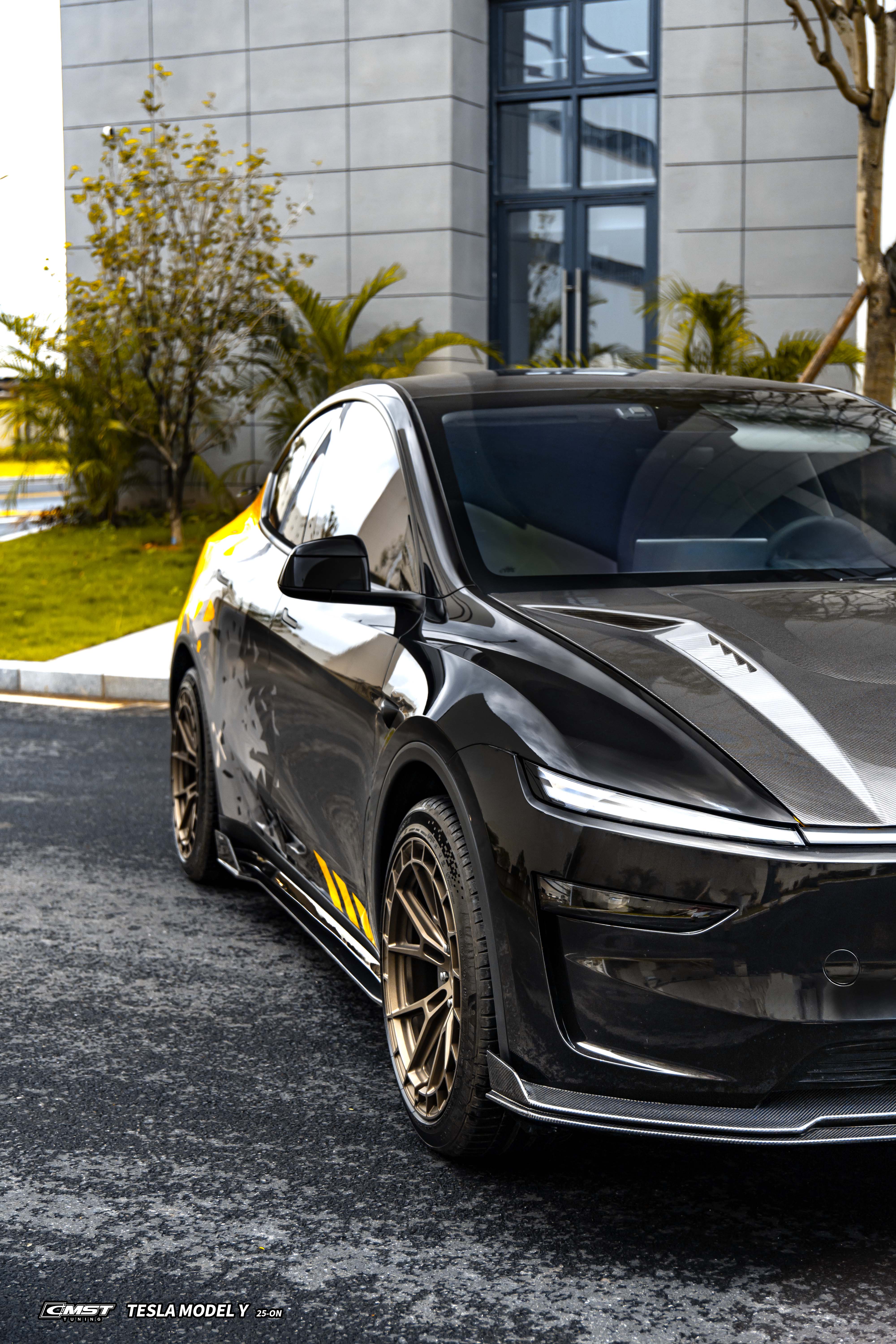 Tesla Model Y Juniper 2026-ON with Aftermarket Parts - V1 Front Lip Carbon Fiber / FRP from CMST Tuning