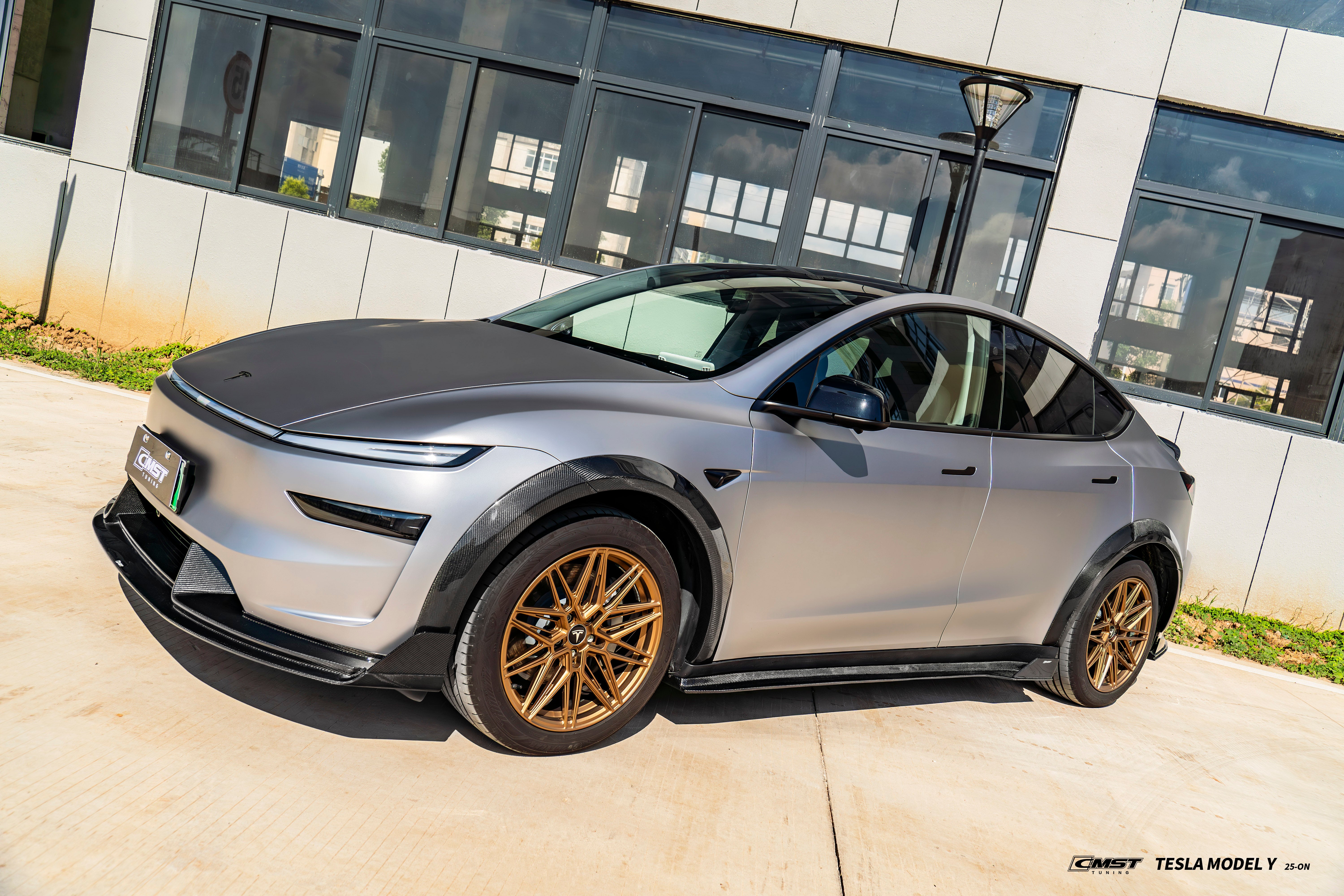 Tesla Model Y Juniper Base 2026-ON with Aftermarket Parts - Front Lip & Splitter Carbon Fiber / FRP from CMST Tuning
