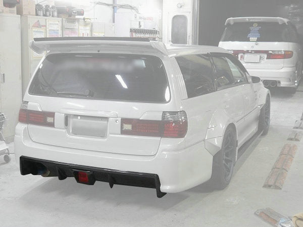 Nissan R34 M34 Stagea1999 2000 2001 2002 2003 2004 with Aftermarket Parts - Rear Bumper Diffuser TK Style Carbon Fiber / FRP from EPR USA
