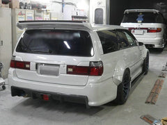 Nissan R34 M34 Stagea1999 2000 2001 2002 2003 2004 with Aftermarket Parts - Rear Bumper Diffuser TK Style Carbon Fiber / FRP from EPR USA