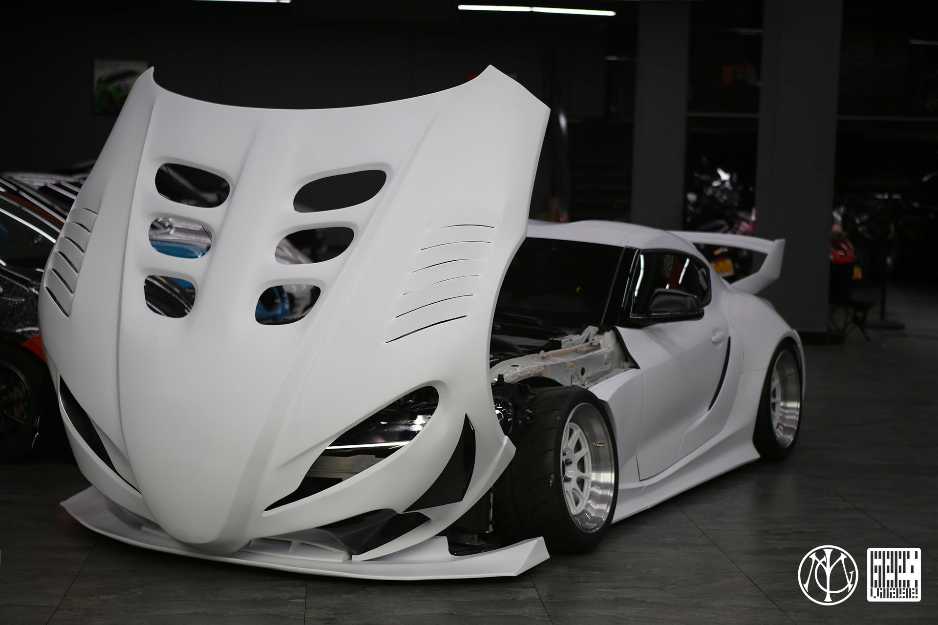 Toyota Supra MK5 A90 A91 3.0 2.0 2020-ON with Aftermarket Parts - Unicorn GT3 Clamshell Hood and Front Bumper & Steel Brackets and Cable for Clamshell Hood and Bumper Carbon Fiber/FRP/Steel from Geex Village