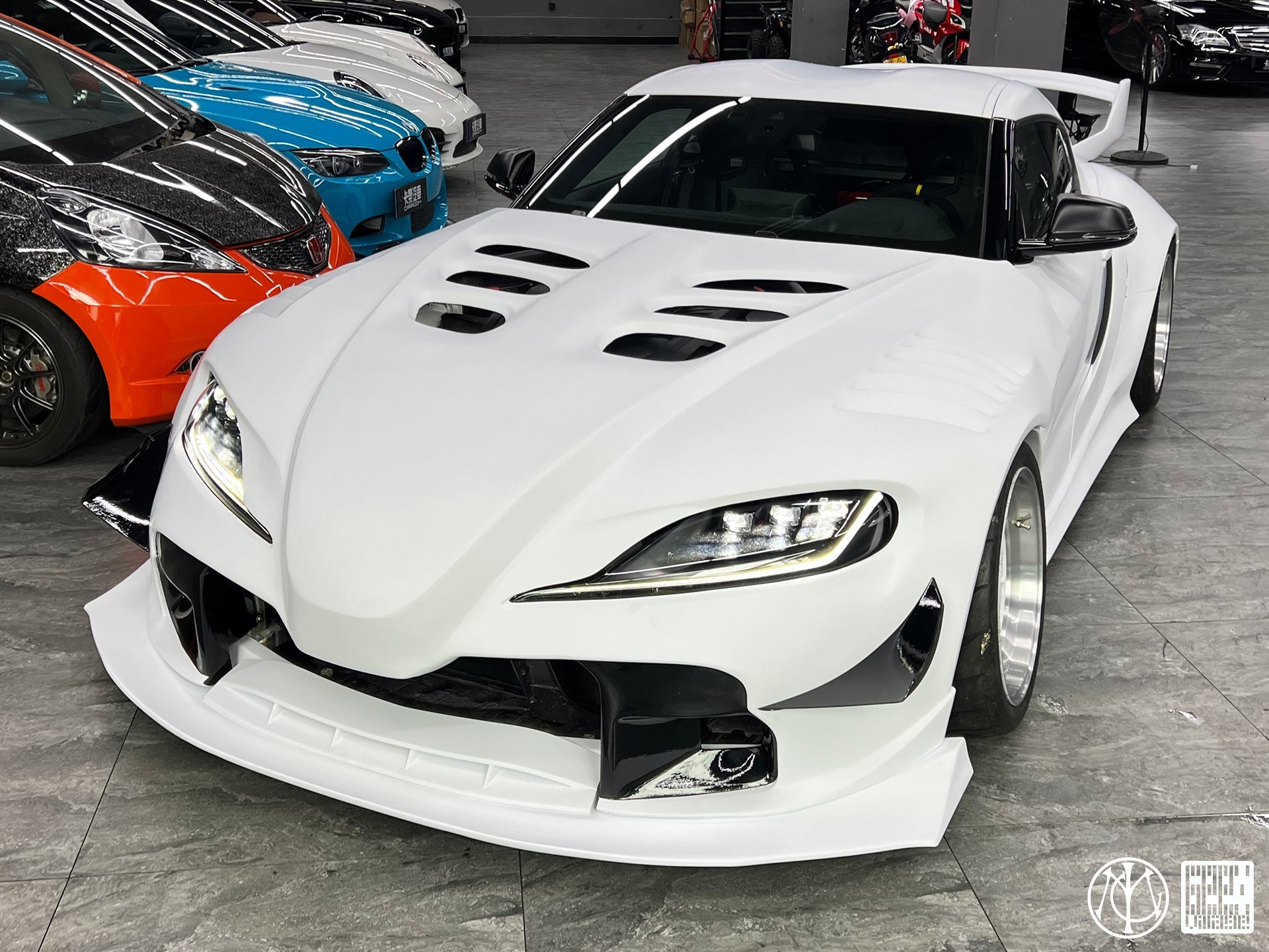 Toyota Supra MK5 A90 A91 3.0 2.0 2020-ON with Aftermarket Parts - Unicorn GT3 Clamshell Hood and Front Bumper & Steel Brackets and Cable for Clamshell Hood and Bumper Carbon Fiber/FRP/Steel from Geex Village