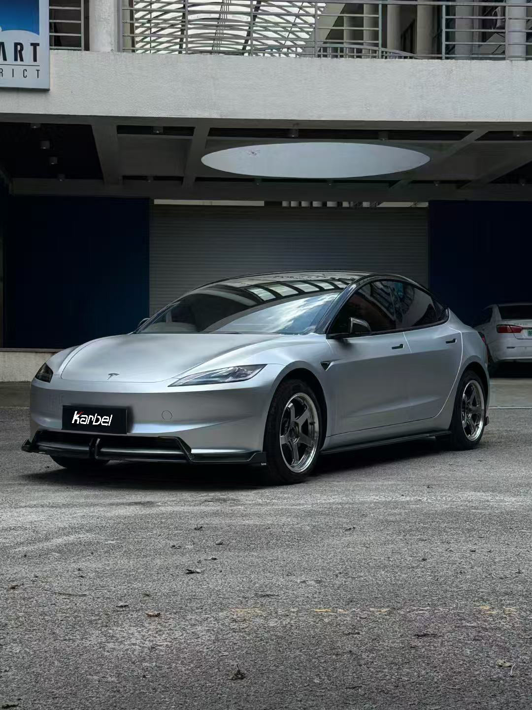  Tesla Model 3 Highland 2024-ON with Aftermarket Parts - Front Lip Dry Pre-preg Carbon Fiber/FRP from Karbel Carbon