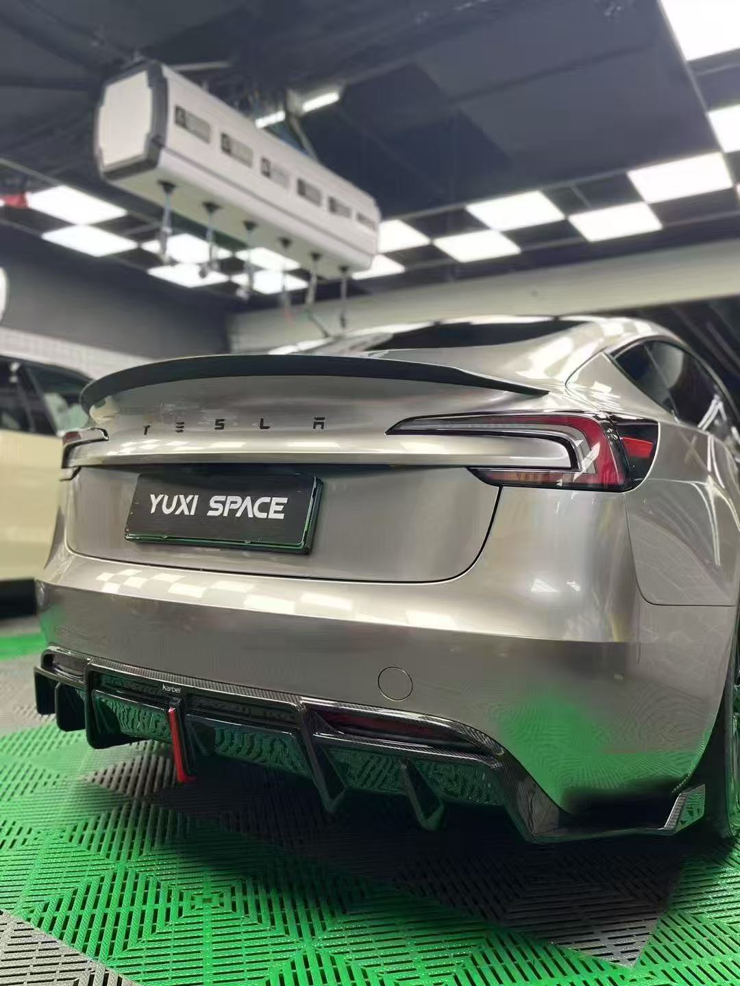 Tesla Model 3 Highland / Performance 2024-ON with Aftermarket Parts - With Light Style Rear Diffuser & Canards Pre-preg Carbon Fiber from Karbel Carbon