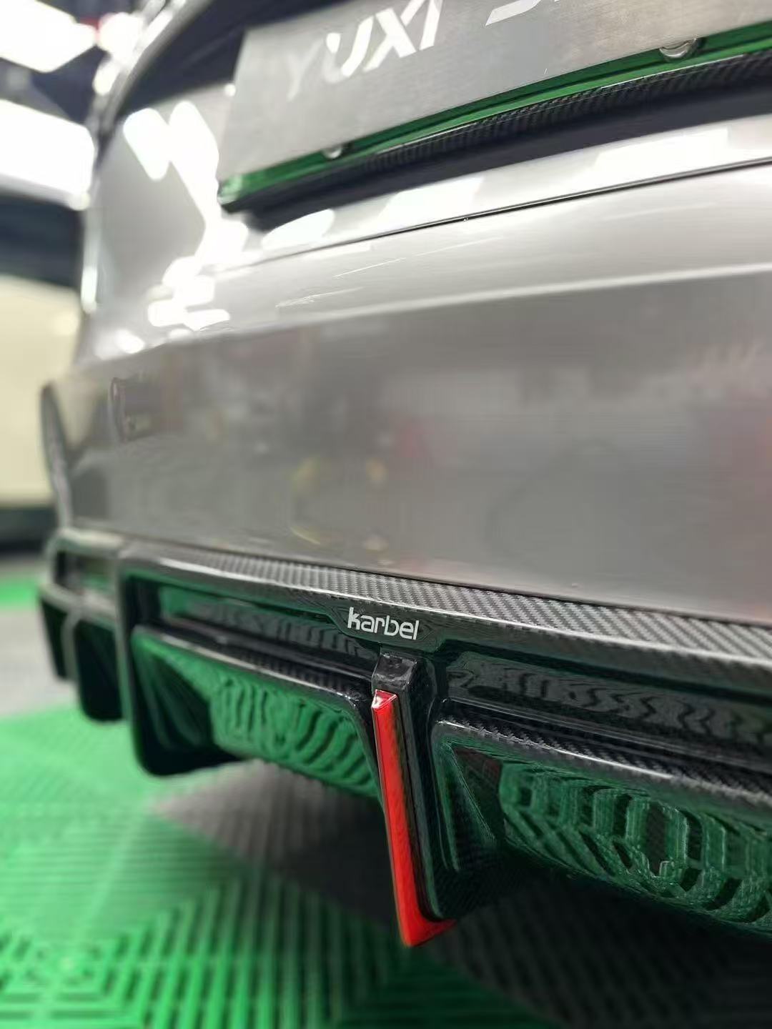Tesla Model 3 Highland / Performance 2024-ON with Aftermarket Parts - With Light Style Rear Diffuser & Canards Pre-preg Carbon Fiber from Karbel Carbon