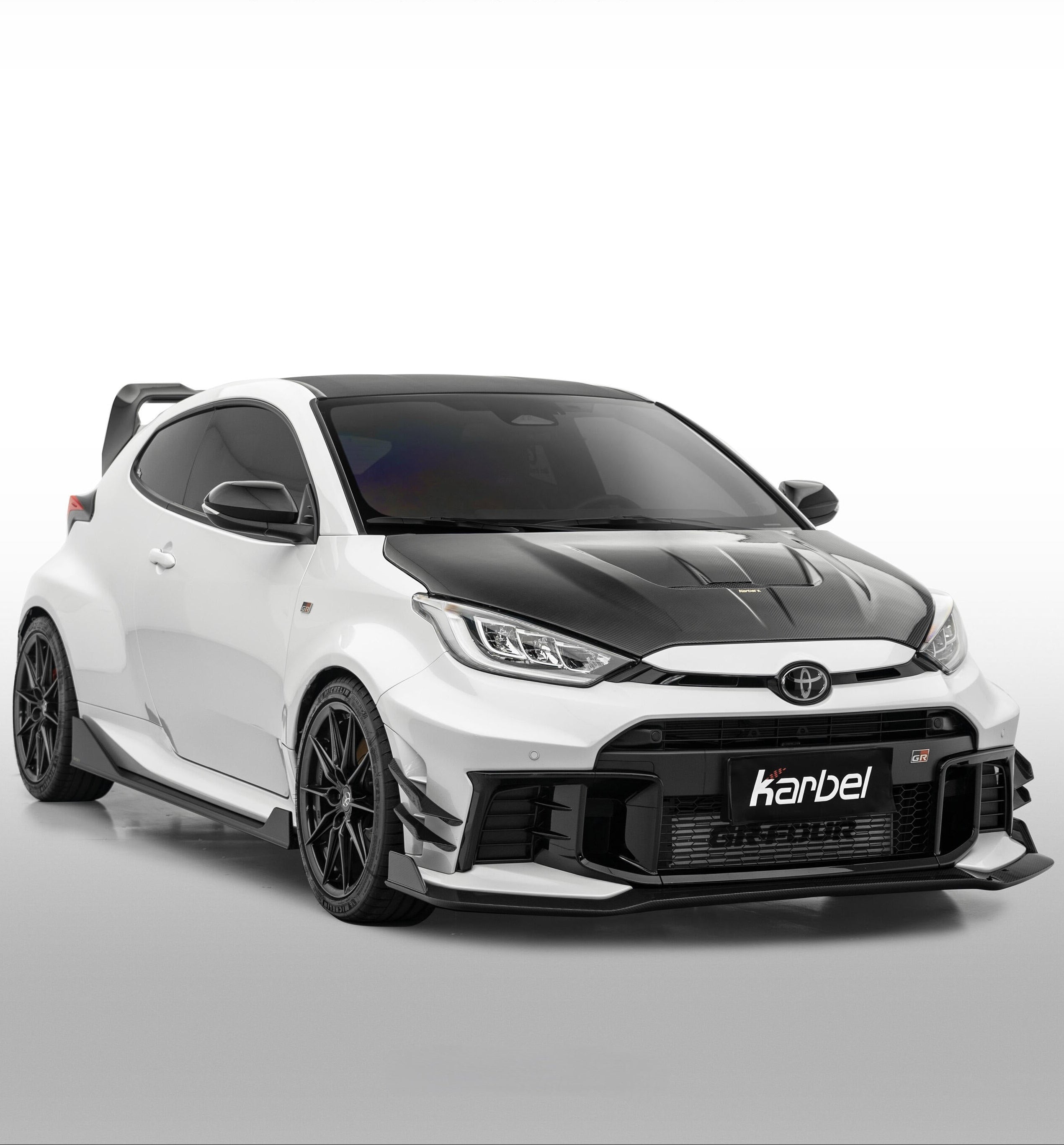 Toyota GR Yaris GXPA16 Facelift 2024-ON with Aftermarket Parts - X Full Body Kit Dry Pre-preg Carbon Fiber from Karbel Carbon