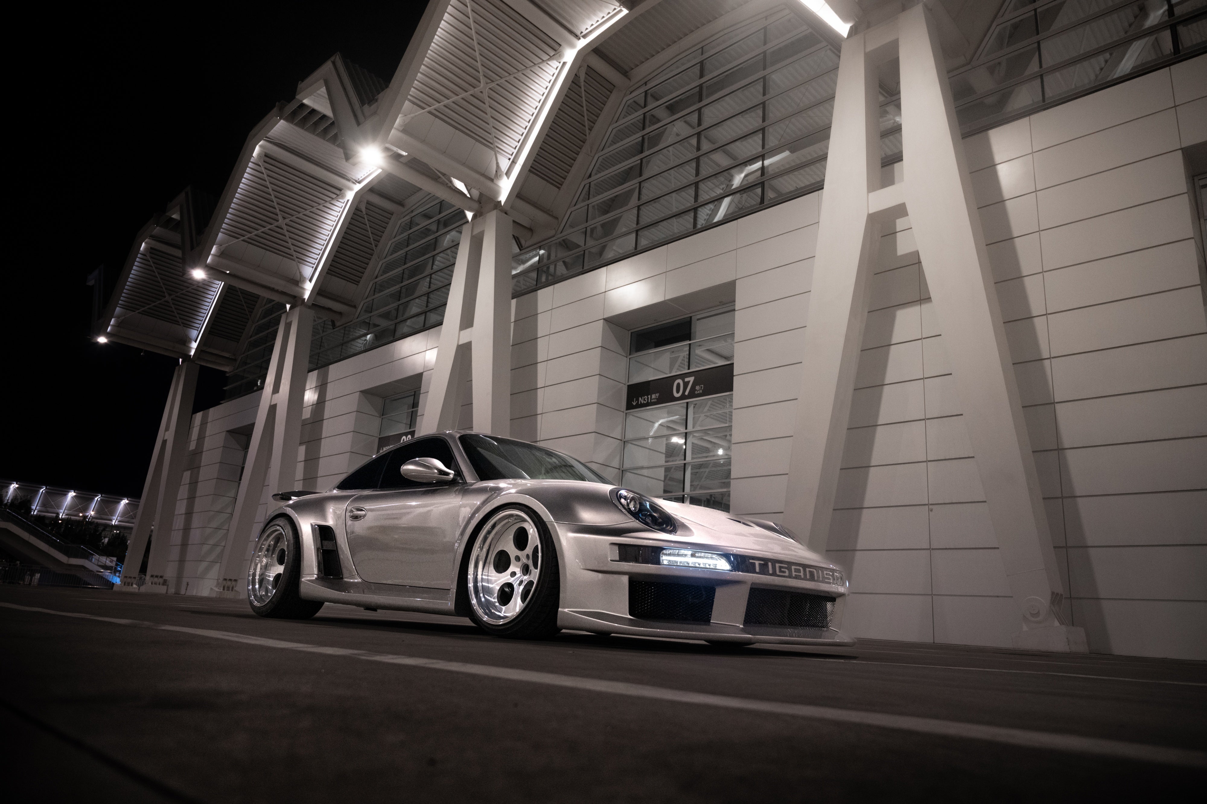Porsche 911 997.1 997.2 Carrera Base S 2009–2012 (997.1 requires 997.2 taillights) with Robot Craftsman's Aftermarket Parts - Package A "TIGANISM GUSTAV" Carbon Fiber / FRP