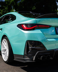 BMW I4 M50 / e Drive 40 G26 2022 2023 2024 & 4 Series Gran Coupe M440i 430i G26 2022 2023 2024 with Aftermarket Parts - Rear Bumper Side Attachment Valence Trim Pre-preg Carbon Fiber from SOOQOO USA