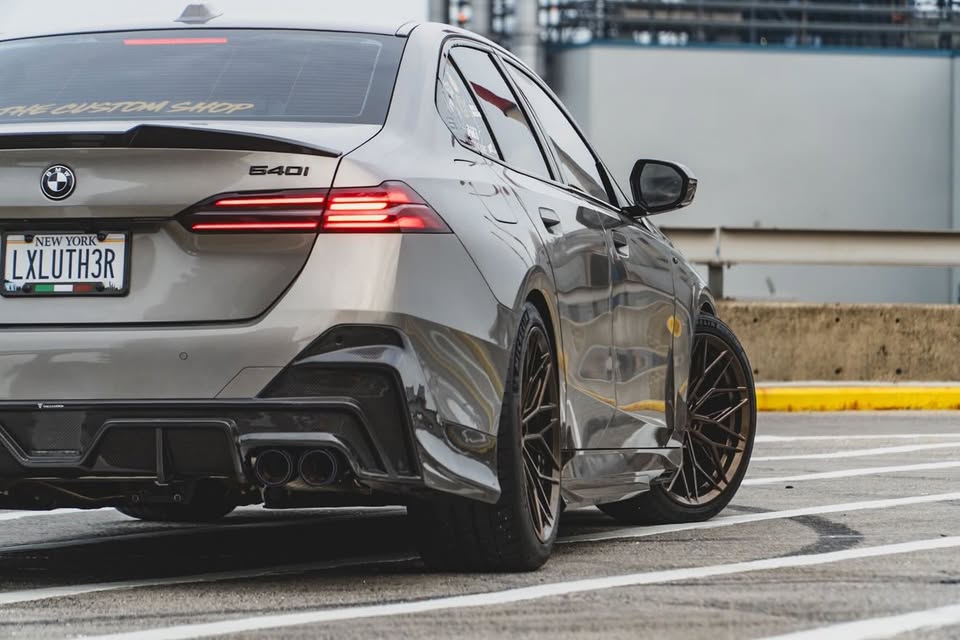 BMW 5 Series 530 540 (with M-package bumper, does not fit base model) G60 G61 2024-ON with Aftermarket Parts - V1 Style Rear Diffuser (Quad Exhaust Tips Included) Pre-preg Carbon Fiber from TAKD Carbon