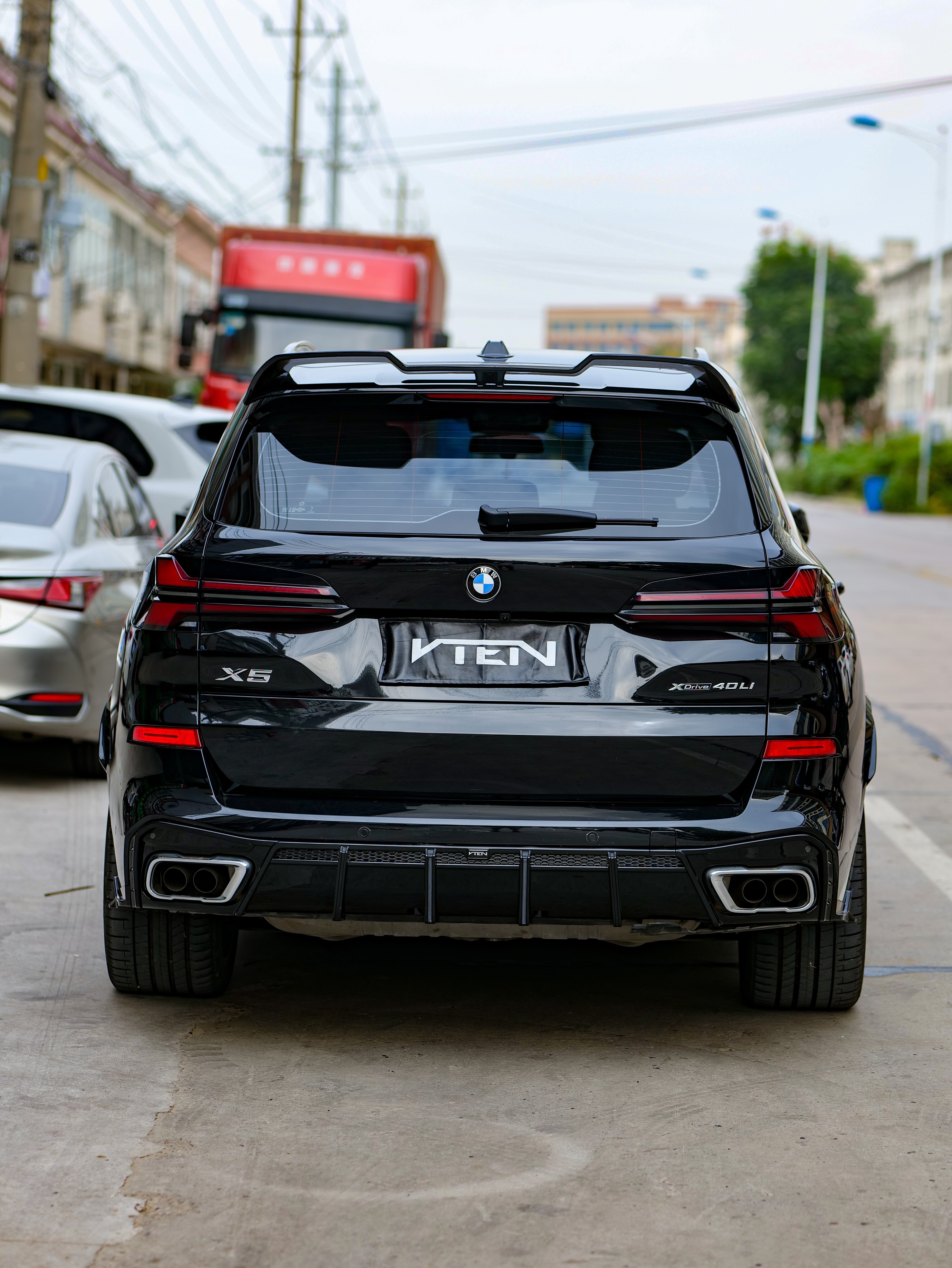 Upgrade Your BMW X5 G05 M50i X/S Drive 40i (with M-Package) (Fits Both Pre-LCI & LCI）2019-ON with VTEN's Aftermarket Parts - Rear Diffuser & Canards PP. A complete transformation of style and performance.