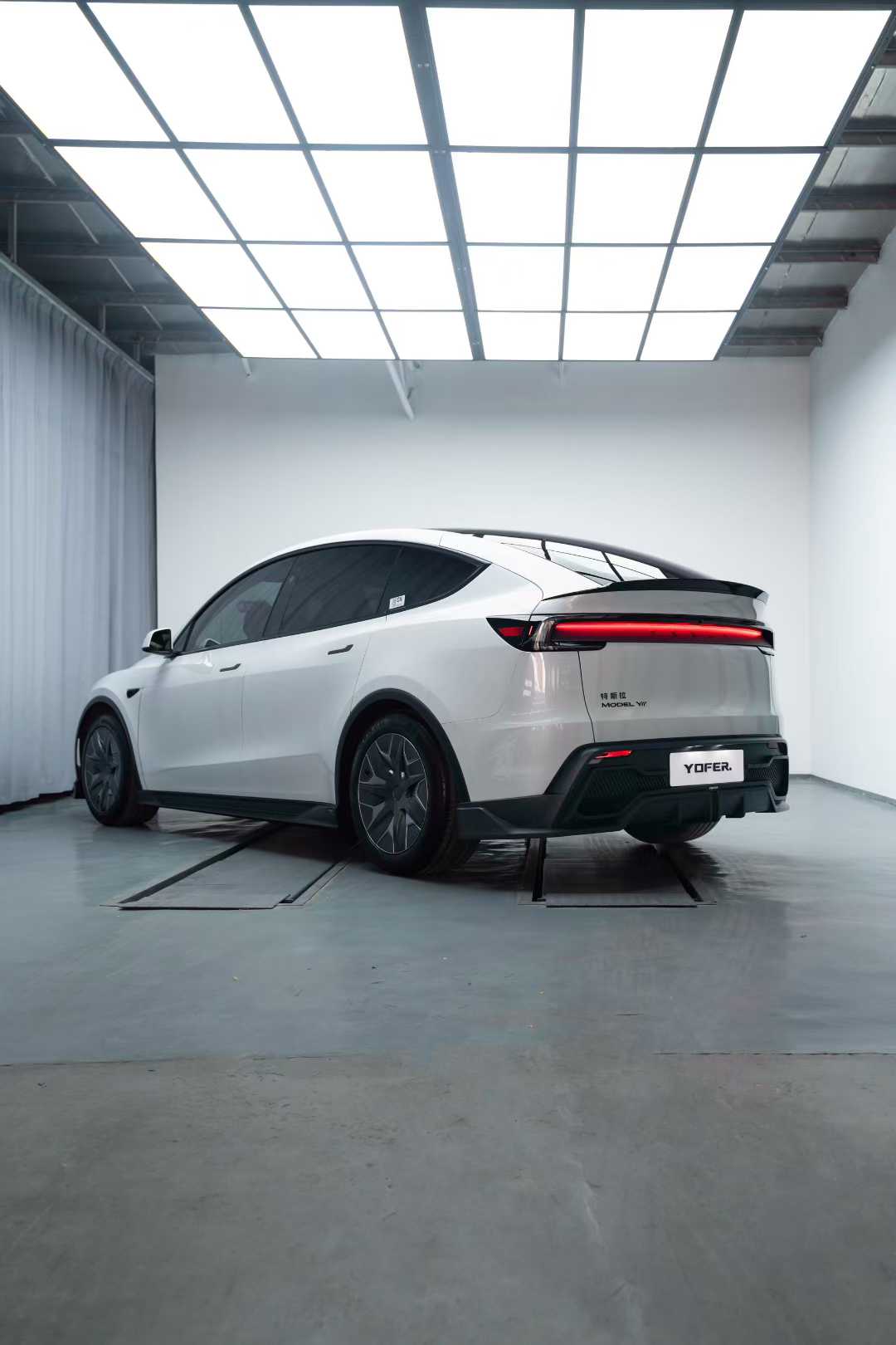 Tesla Model Y Juniper 2026-ON with Aftermarket Parts - Loong Flames Rear Diffuser PP Polypropylene from Yofer USA