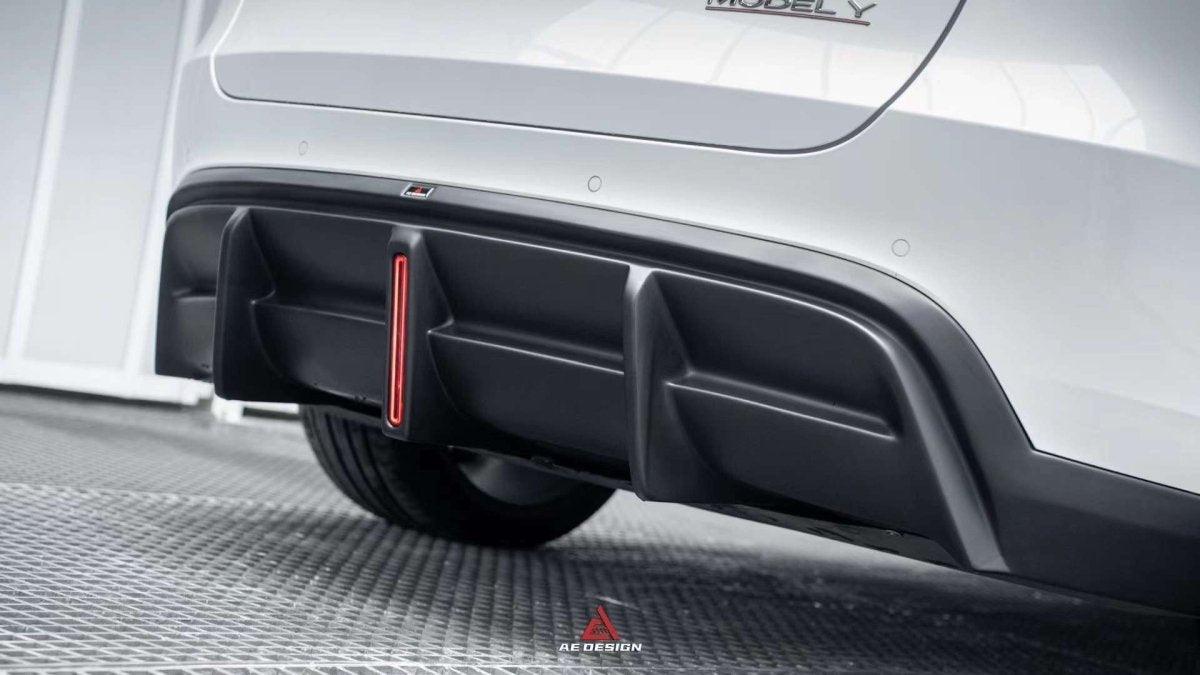 Tesla Model Y 2021 2022 2023 2024 with Aftermarket Parts - Plustic Style Rear Diffuser ABS from  ArmorExtend