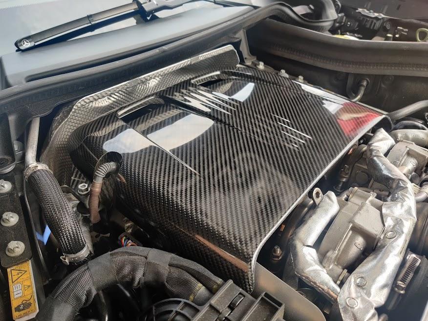Mercedes Benz GLC63 AMG X254 C254 2018-2021 with CMST Tuning's Aftermarket Parts - Carbon Fiber / FRP Engine Cover. A complete transformation of style and performance.