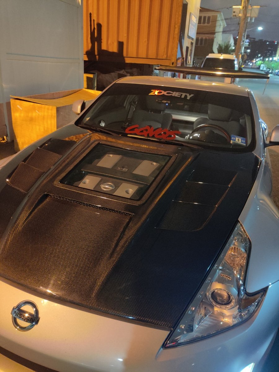 Nissan 370Z Nismo Sport Touring Base Fairlady Z Z34 2009-2020 with Aftermarket Parts - V1 Glass Clearview Style Hood Bonnet Carbon Fiber / FRP from CMST Tuning
